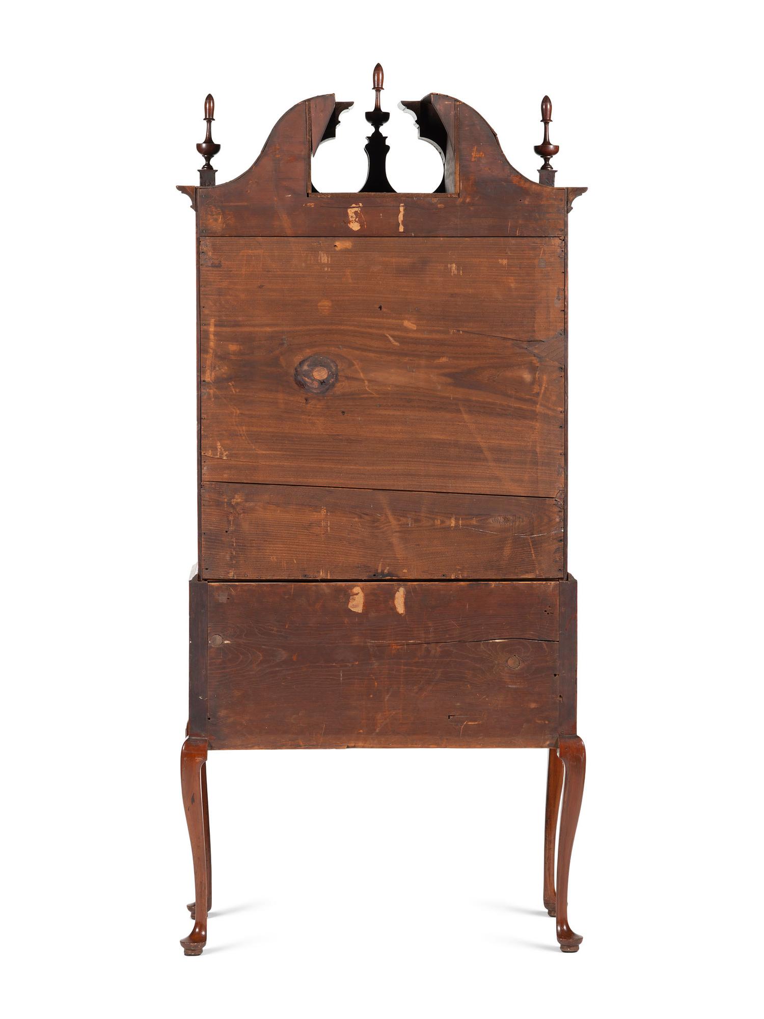 A Queen Anne Fan-Carved Cherrywood Bonnet-Top High Chest
