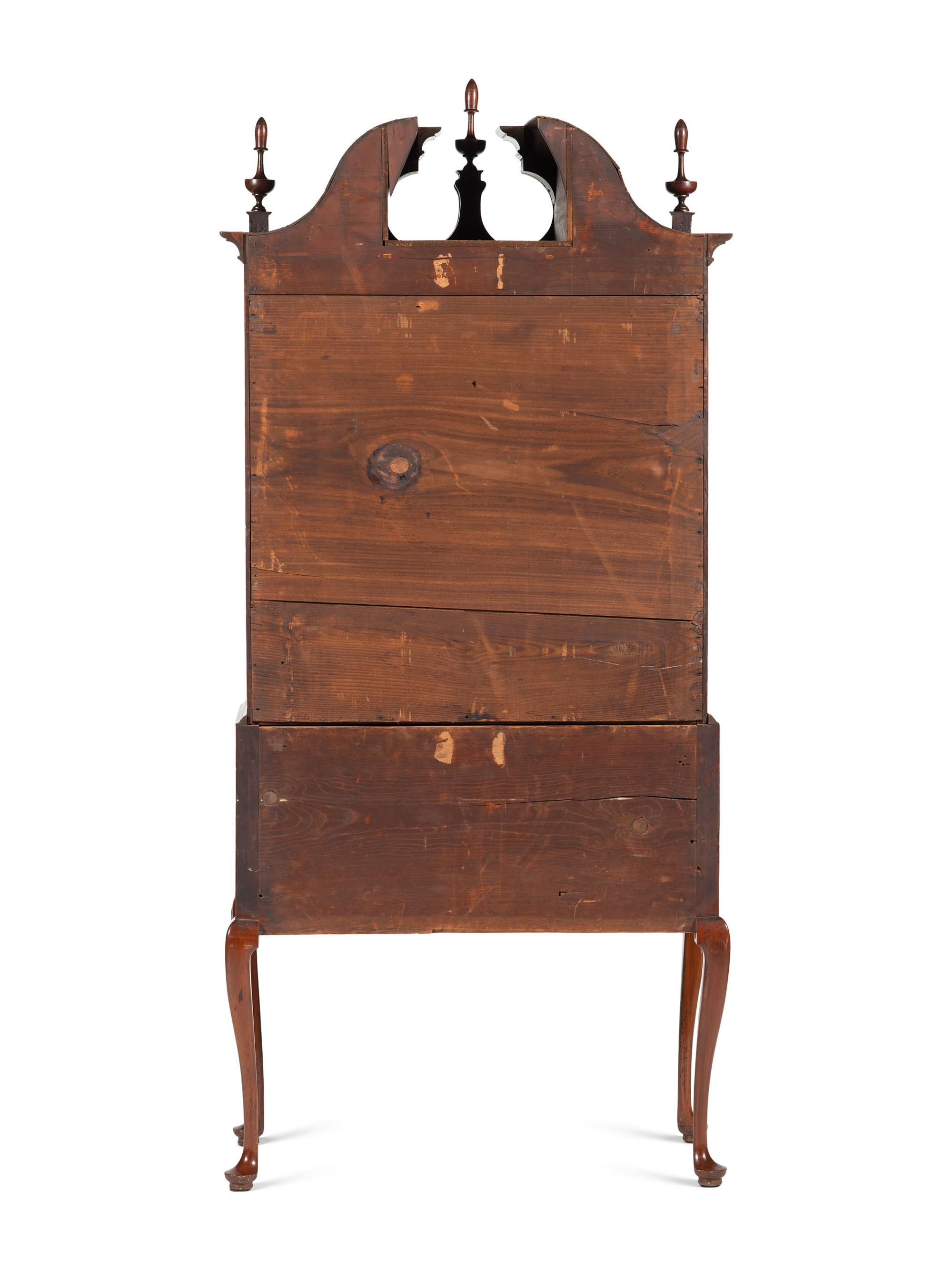 A Queen Anne Fan-Carved Cherrywood Bonnet-Top High Chest