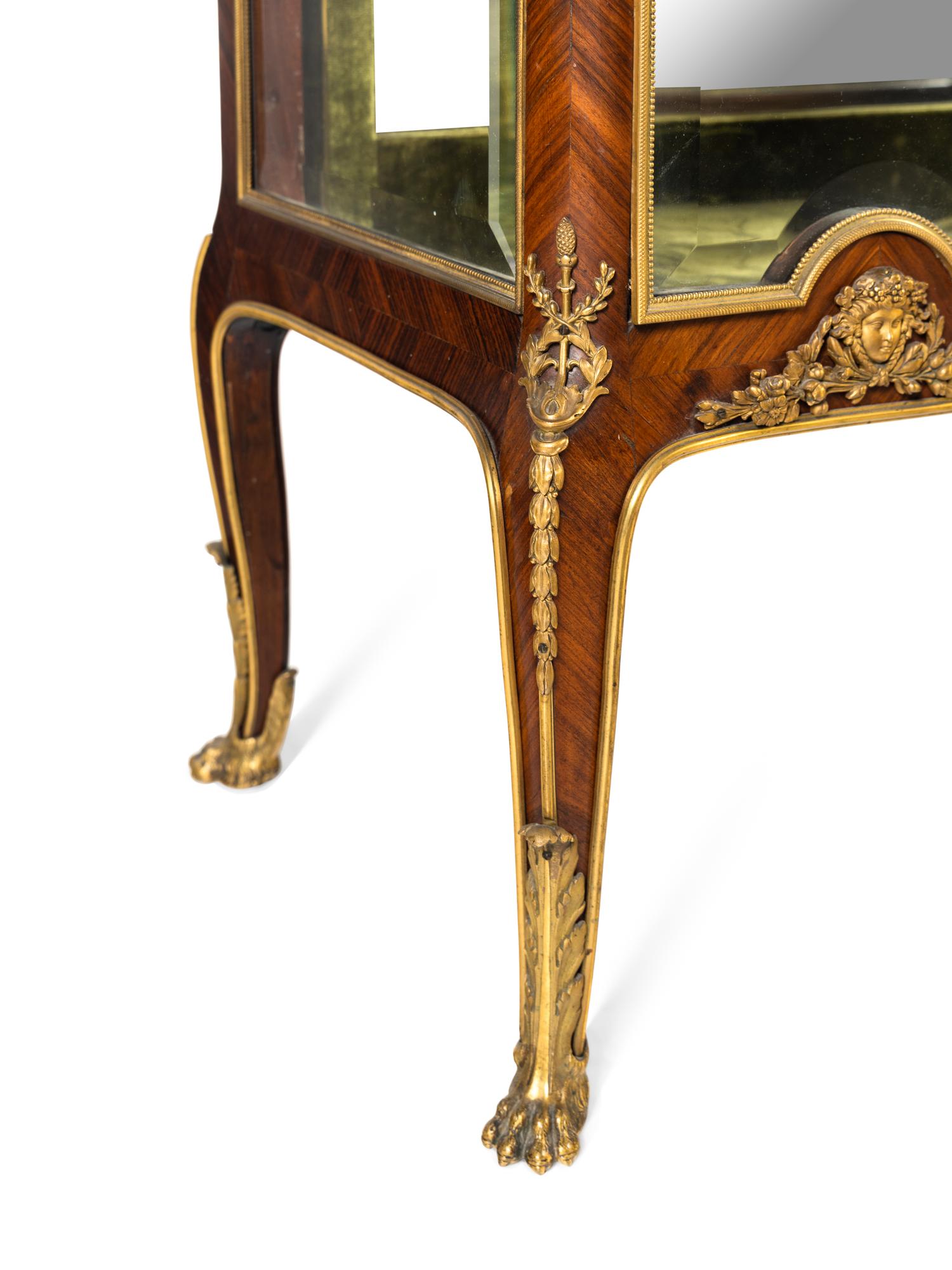 A Louis XV Style Gilt Bronze Mounted Kingwood Marble-Top Vitrine