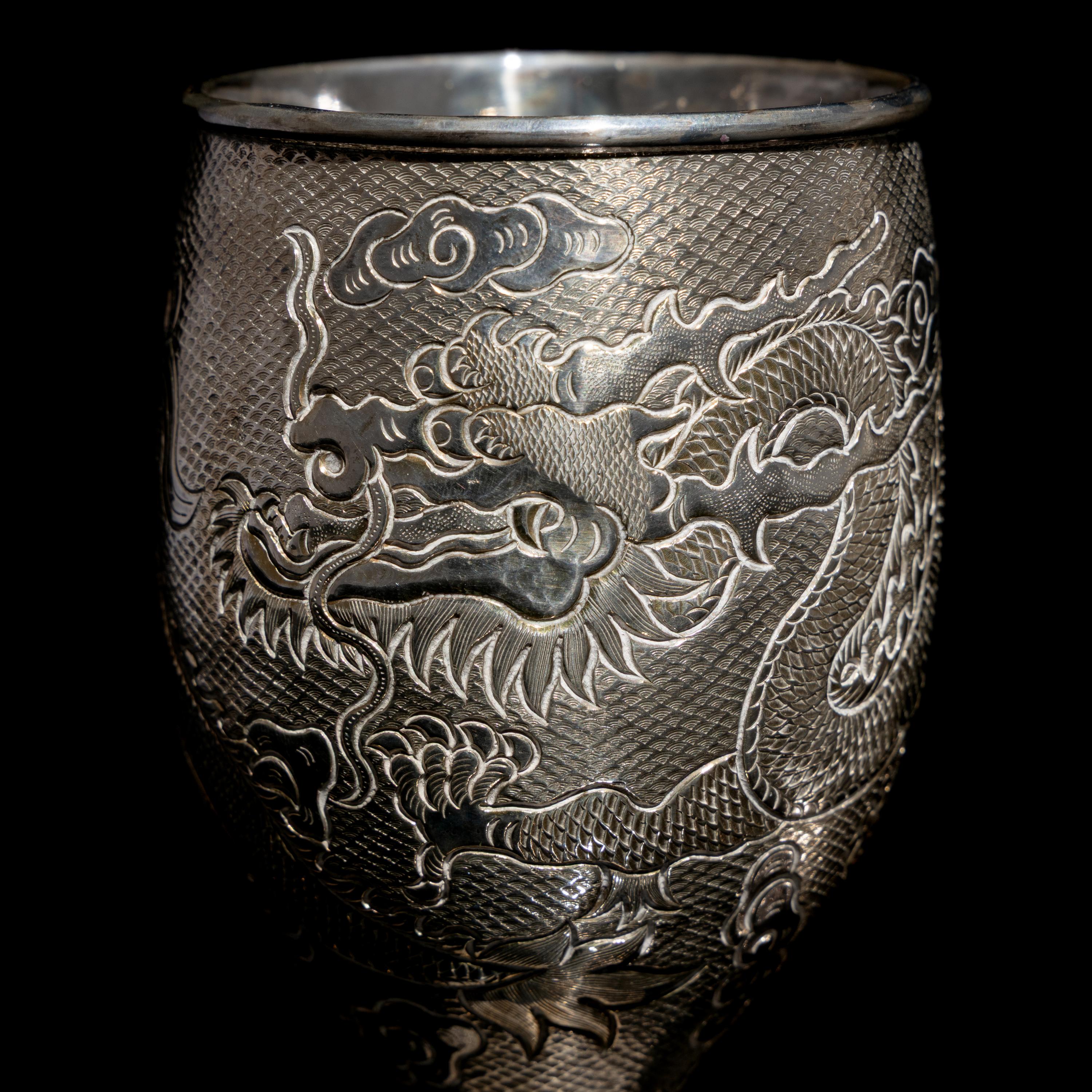 A Pair of Chinese Export Silver 'Dragon' Wine Cups, 20th Century 近代 外銷鏨云龍紋酒杯一對