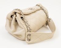 A Chanel Cream Lambskin Quilted Shoulder Bag, 9.5" x 7" x 5.5"; Strap drop: 10".