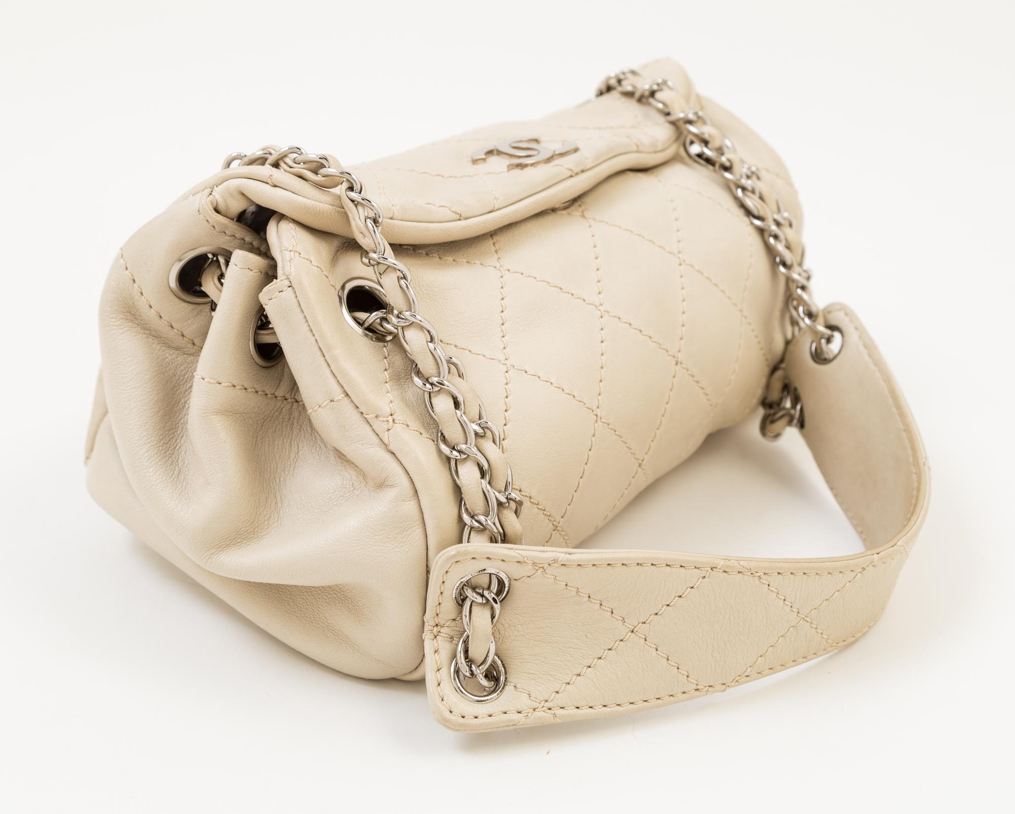 A Chanel Cream Lambskin Quilted Shoulder Bag, 9.5" x 7" x 5.5"; Strap drop: 10".