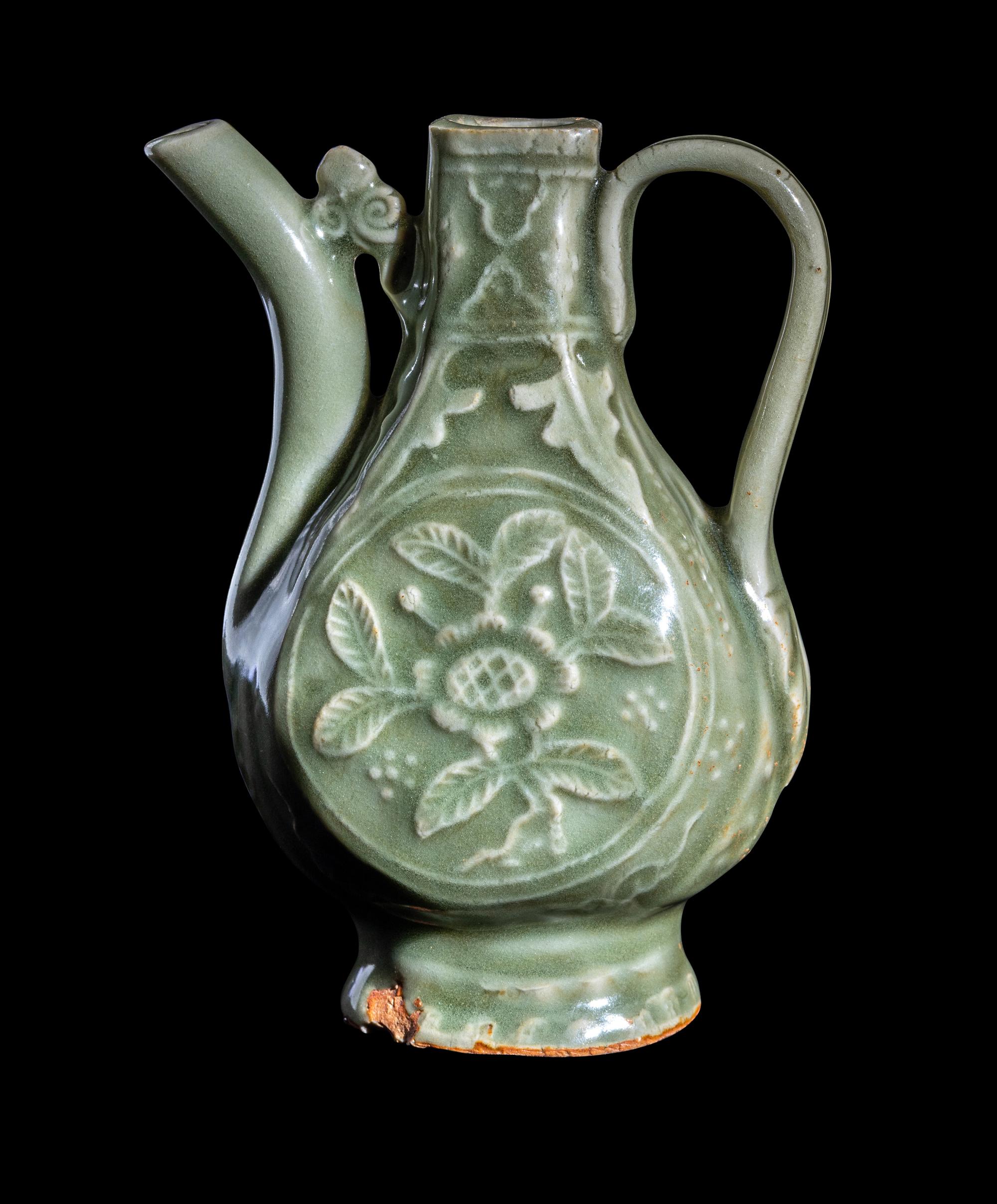 A Chinese Carved Longquan Celadon Glazed Porcelain Ewer