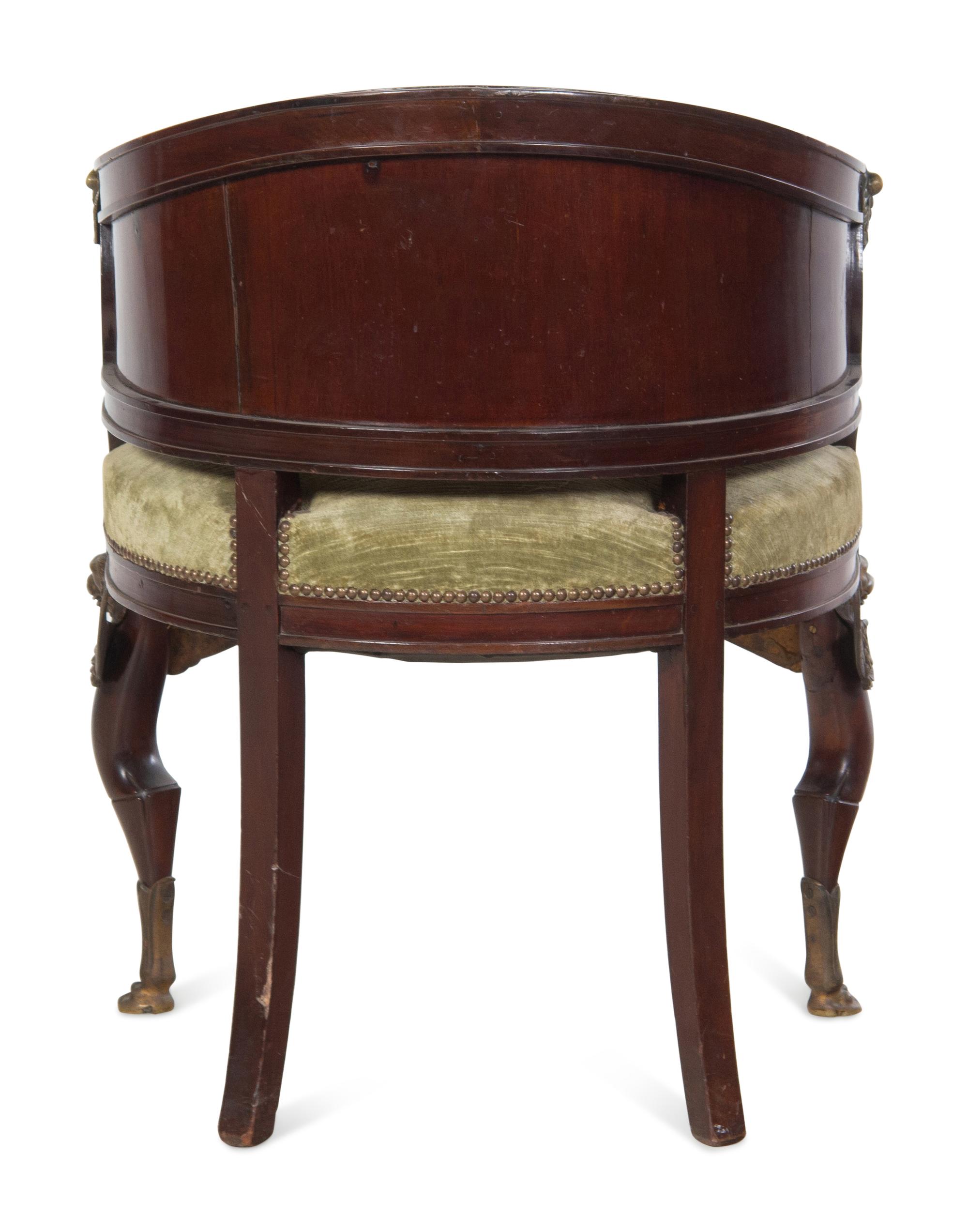 An Empire Style Gilt Bronze Mounted Mahogany Bergère de Bureau