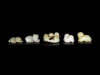 Five Chinese Celadon Jade Carved Recumbent Mythical Beasts