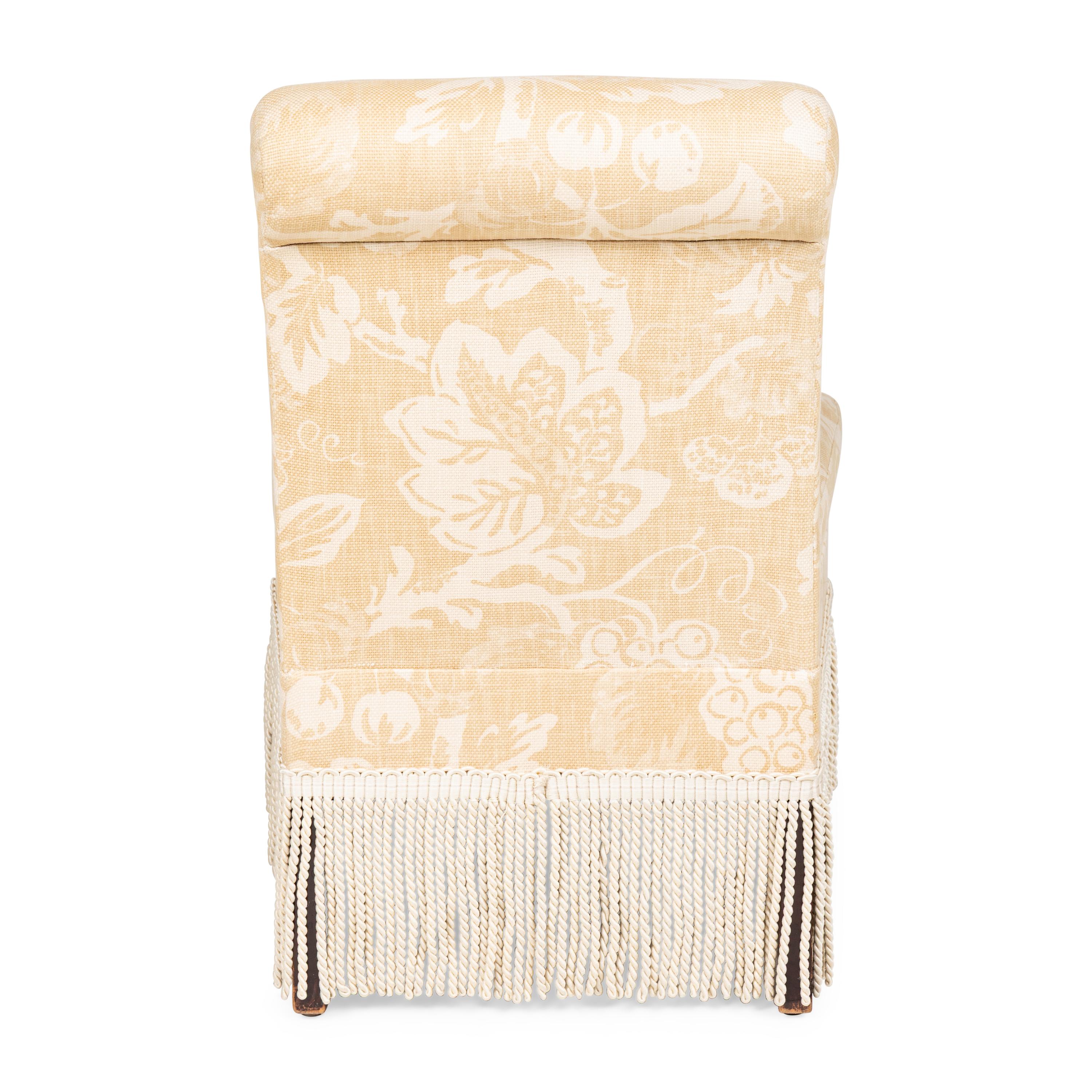 An Upholstered Slipper Chair with Bullion Fringe