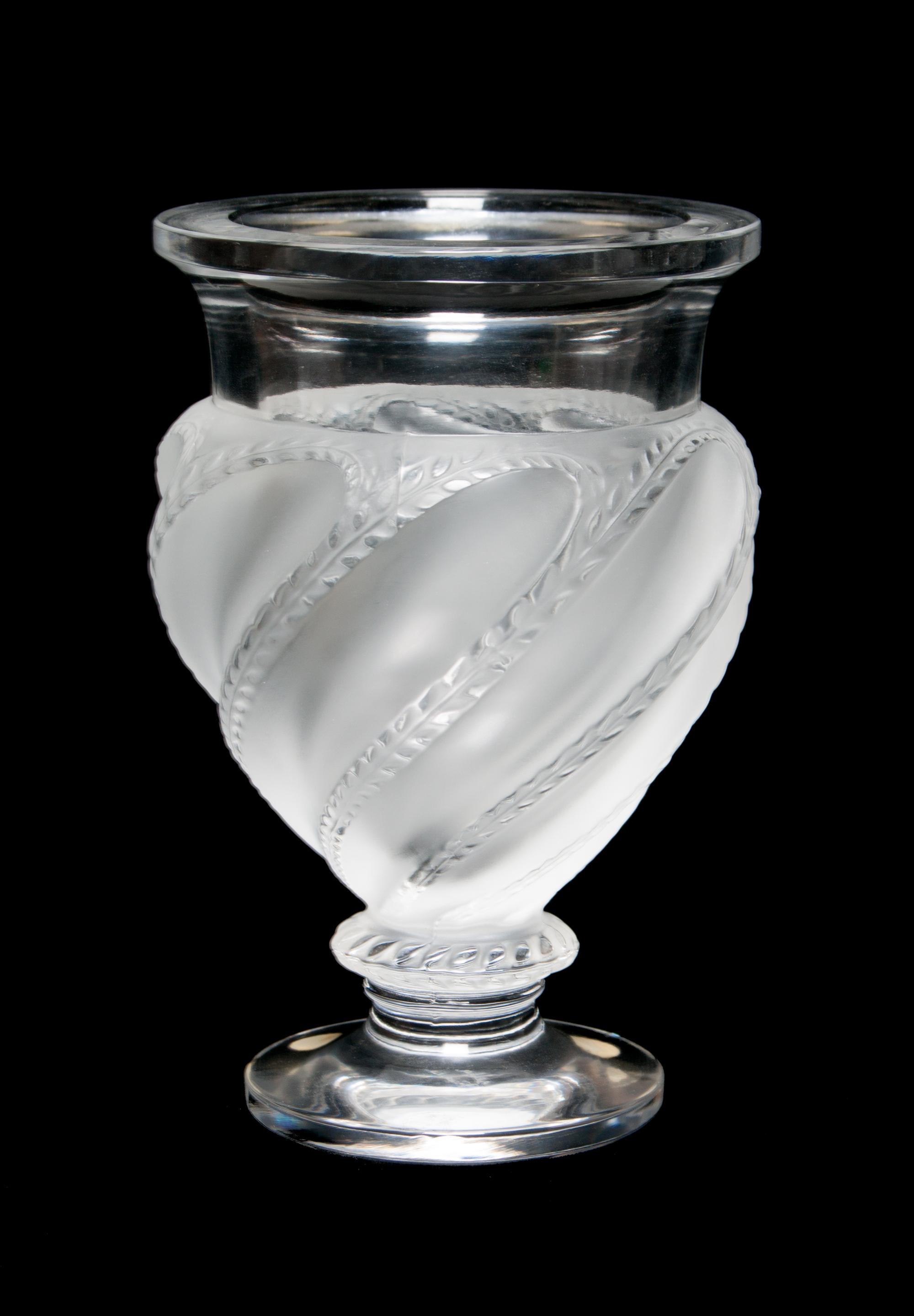 A Lalique Molded and Frosted Glass Vase Height 5 7/8 inches.