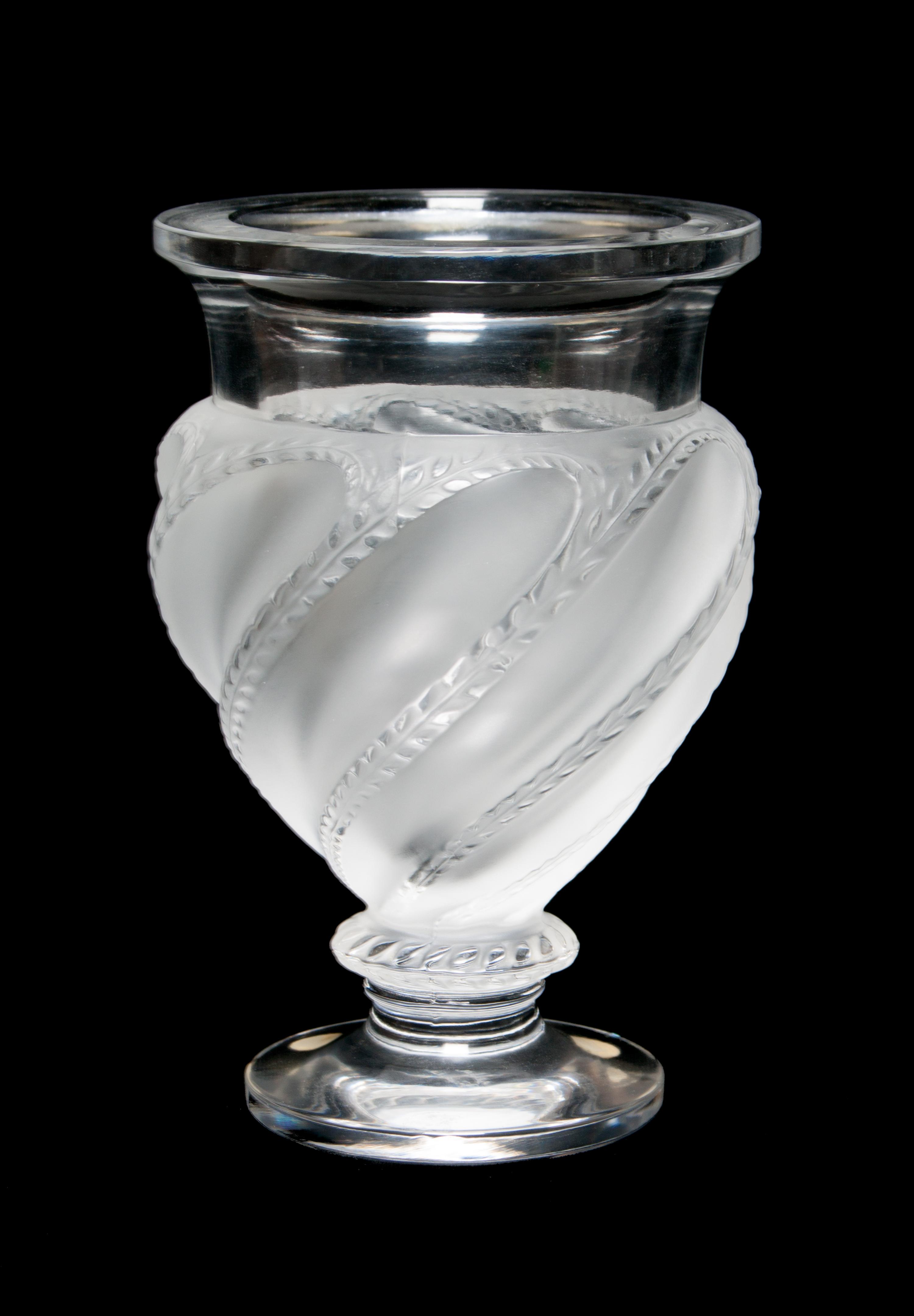 A Lalique Molded and Frosted Glass Vase Height 5 7/8 inches.
