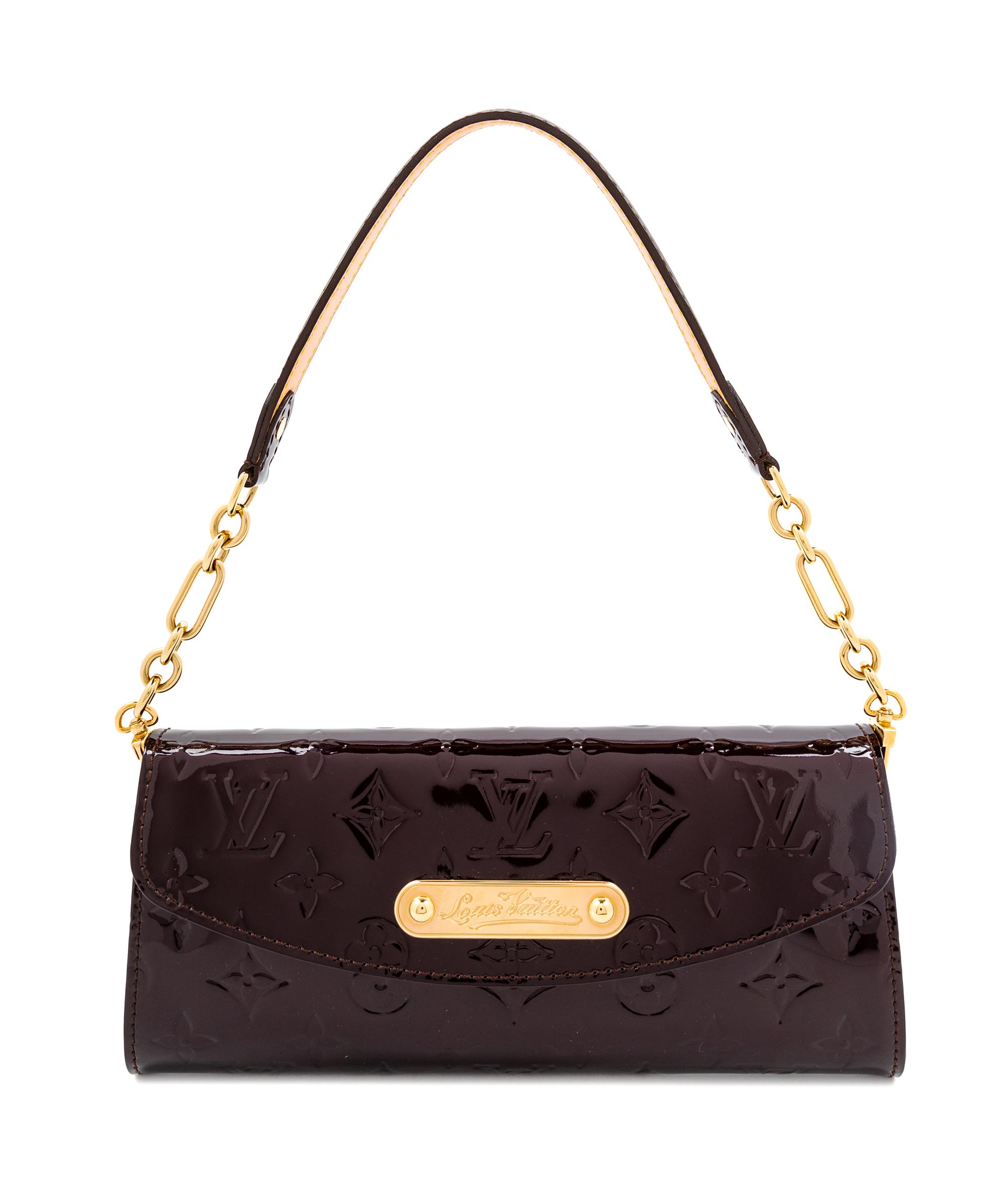 A Louis Vuitton Maroon Vernis Monogram Sunset Boulevard Bag, 4.5" H x 9.25" W x 1.25" D"; Shoulder drop: 7".