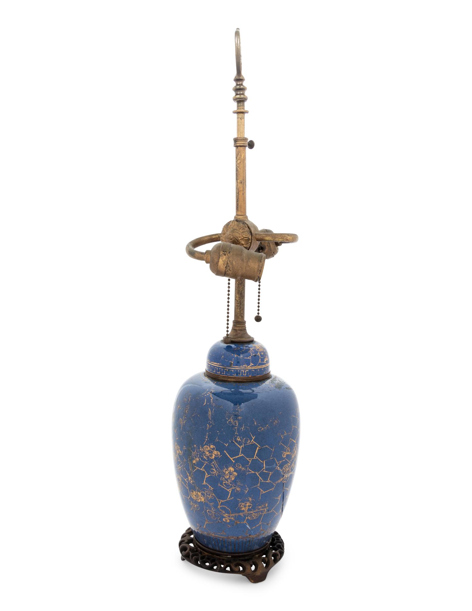 A Chinese Powder Blue Ground Gilt Decorated Ginger Jar and Cover