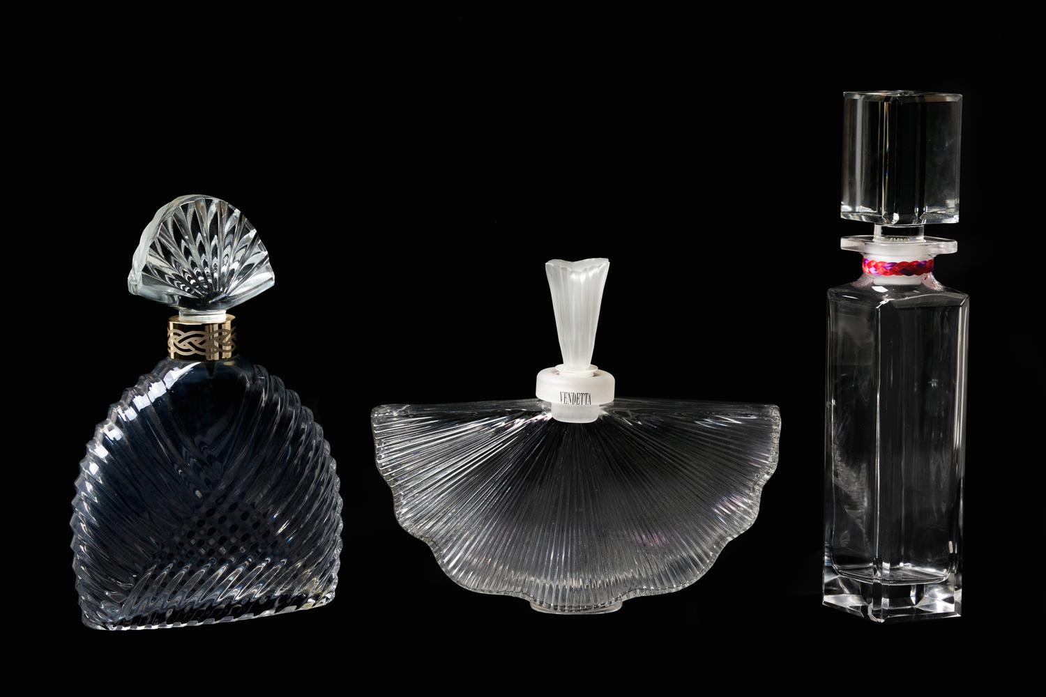 A Group of Three Factice Perfume Bottles