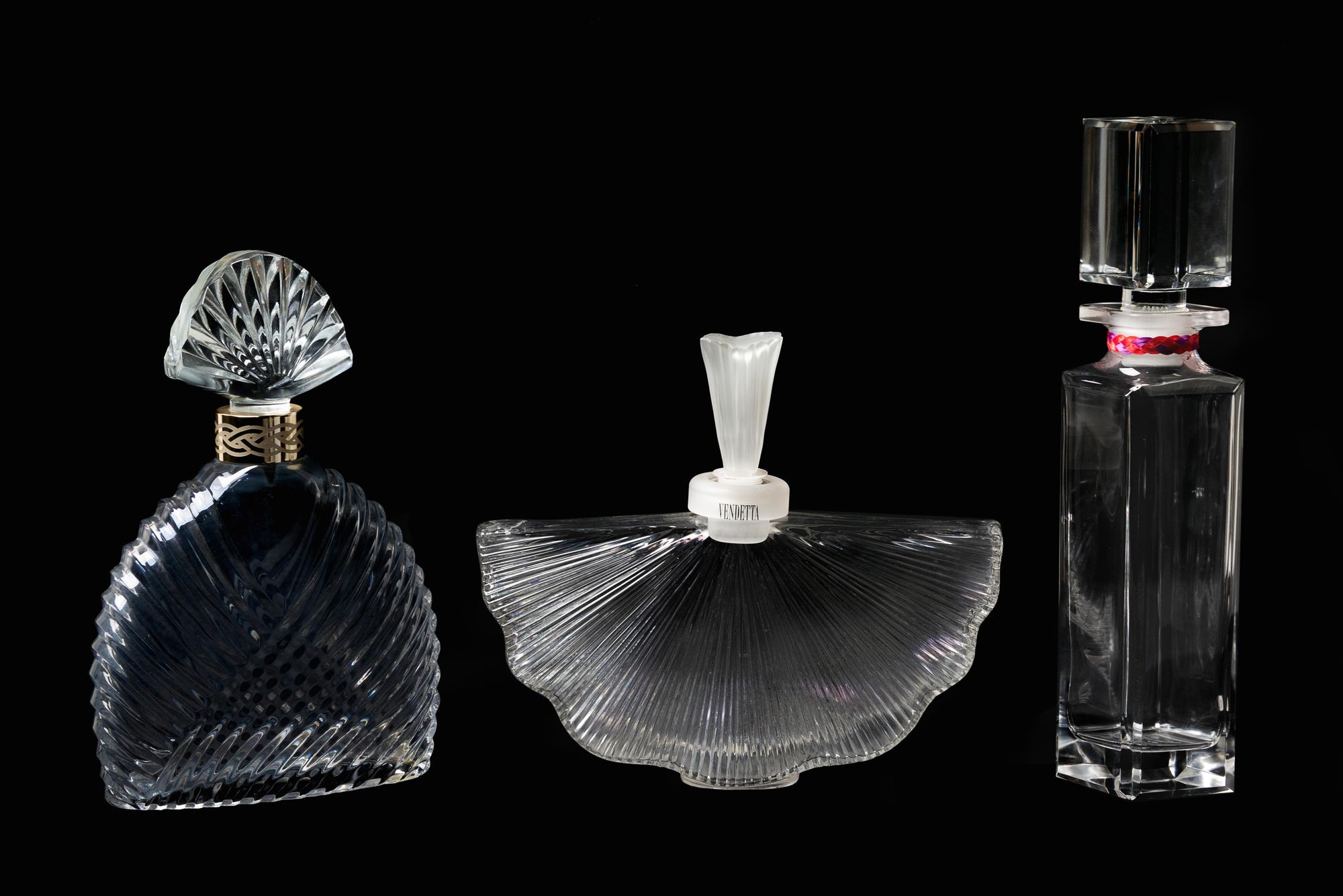 A Group of Three Factice Perfume Bottles