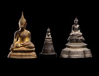 Three Thai Silver Veneered and Gilt Bronze Figures of Seated Buddha