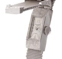 BAUME & MERCIER, 14K WHITE GOLD AND DIAMOND SURPRISE WRISTWATCH