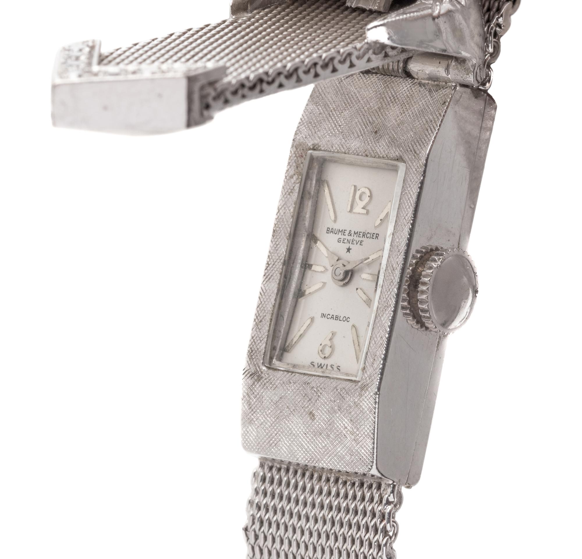 BAUME & MERCIER, 14K WHITE GOLD AND DIAMOND SURPRISE WRISTWATCH
