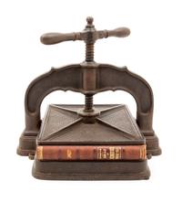 An Iron Book Press Height 11 3/4 inches. — 20TH CENTURY