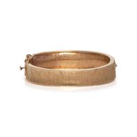 YELLOW GOLD AND EMERALD BANGLE BRACELET