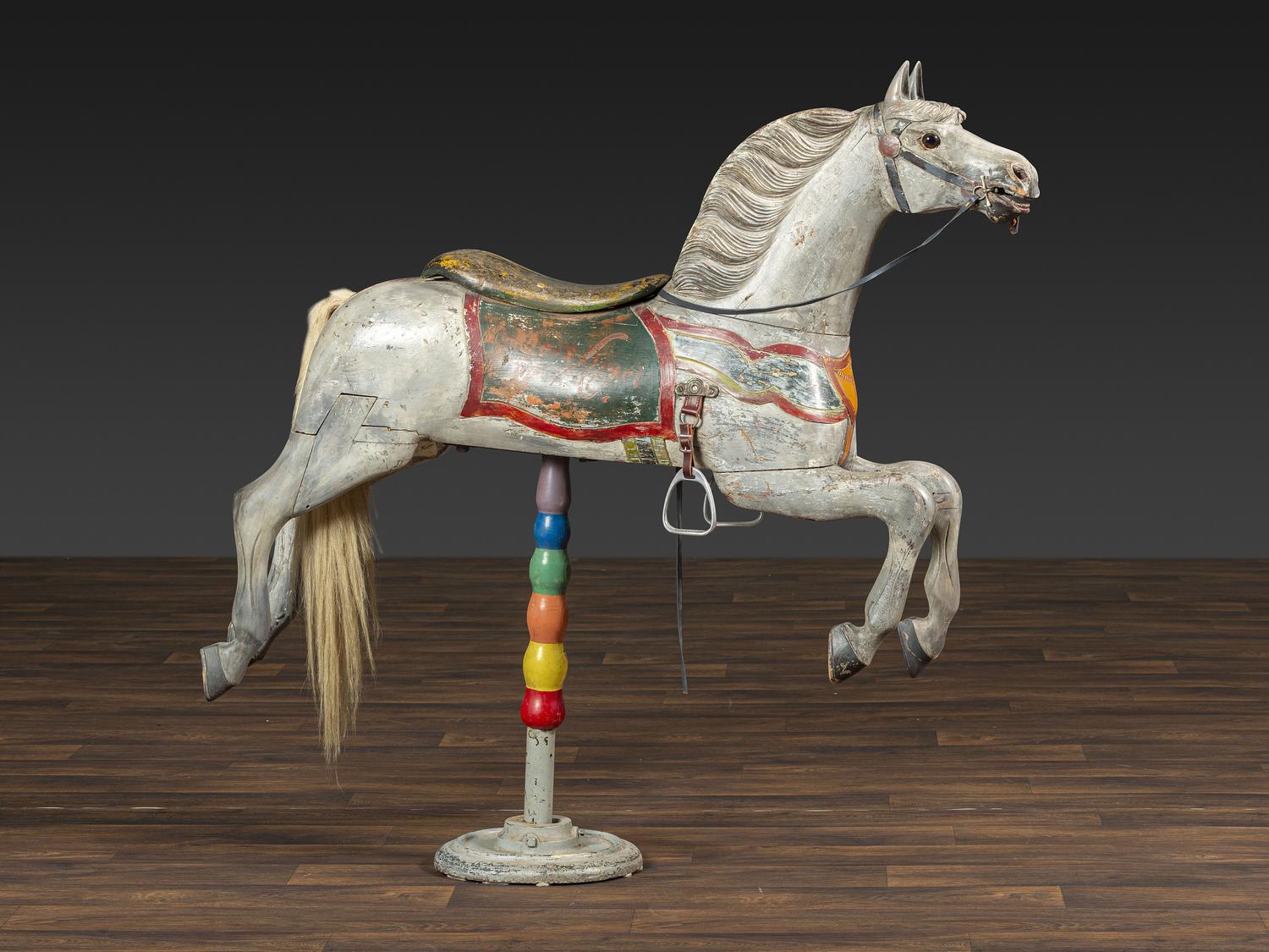 A Herschell-Spillman Carved and Painted Wood Carousel Horse