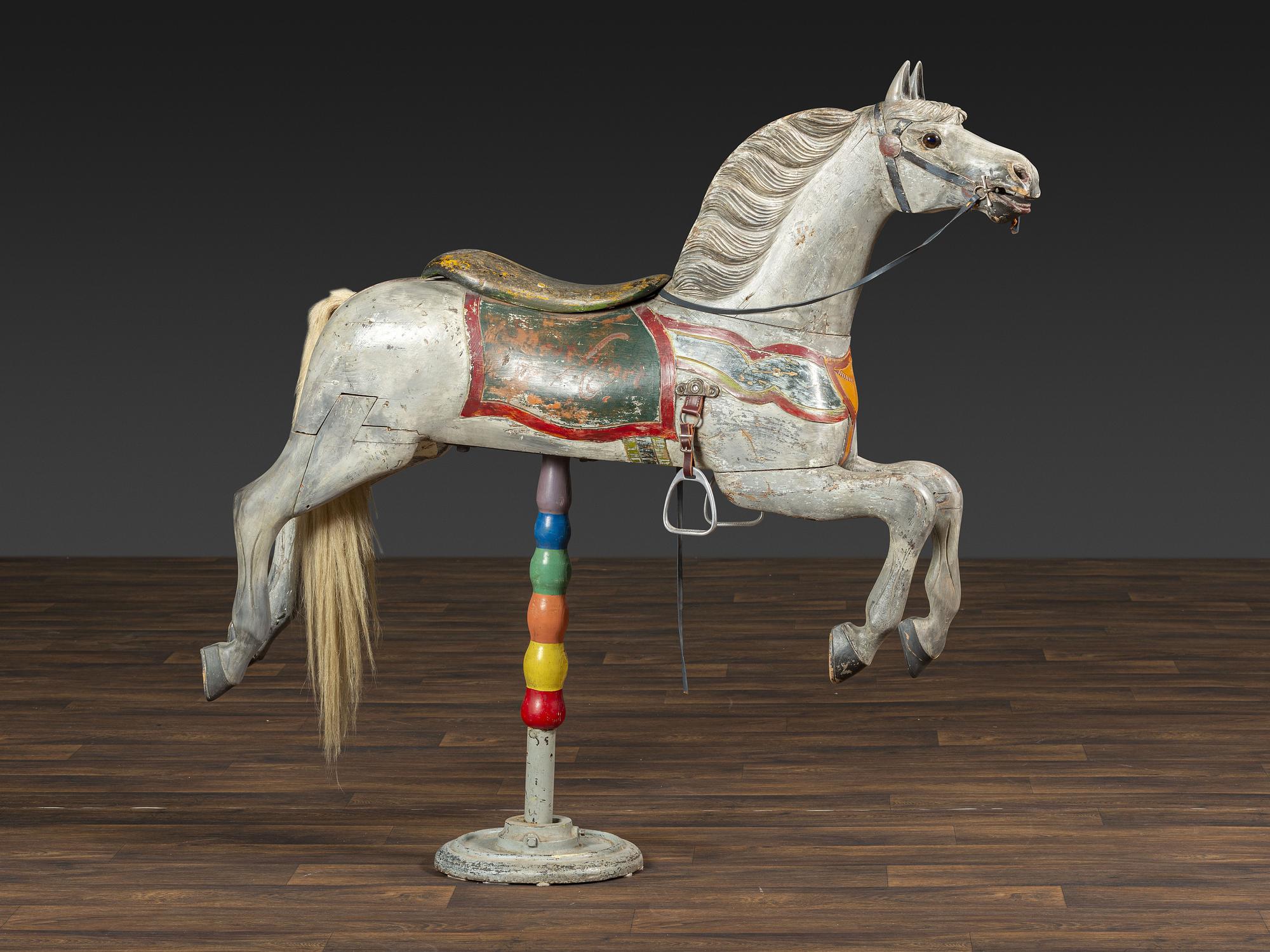 A Herschell-Spillman Carved and Painted Wood Carousel Horse