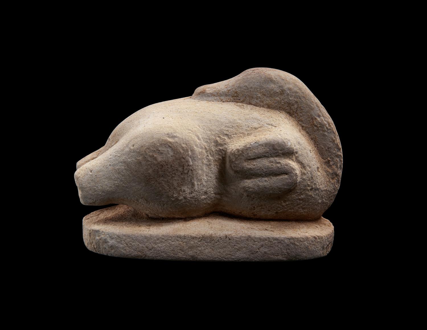 An Egyptian Limestone Model of a Trussed Duck