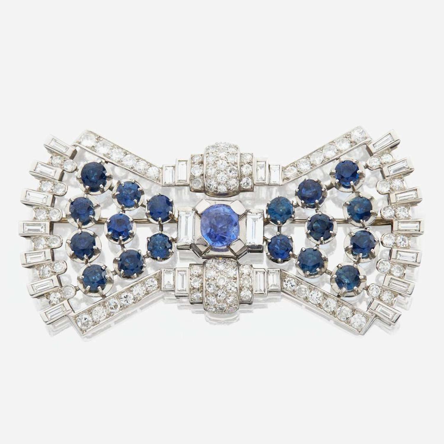 A diamond, sapphire, and platinum brooch