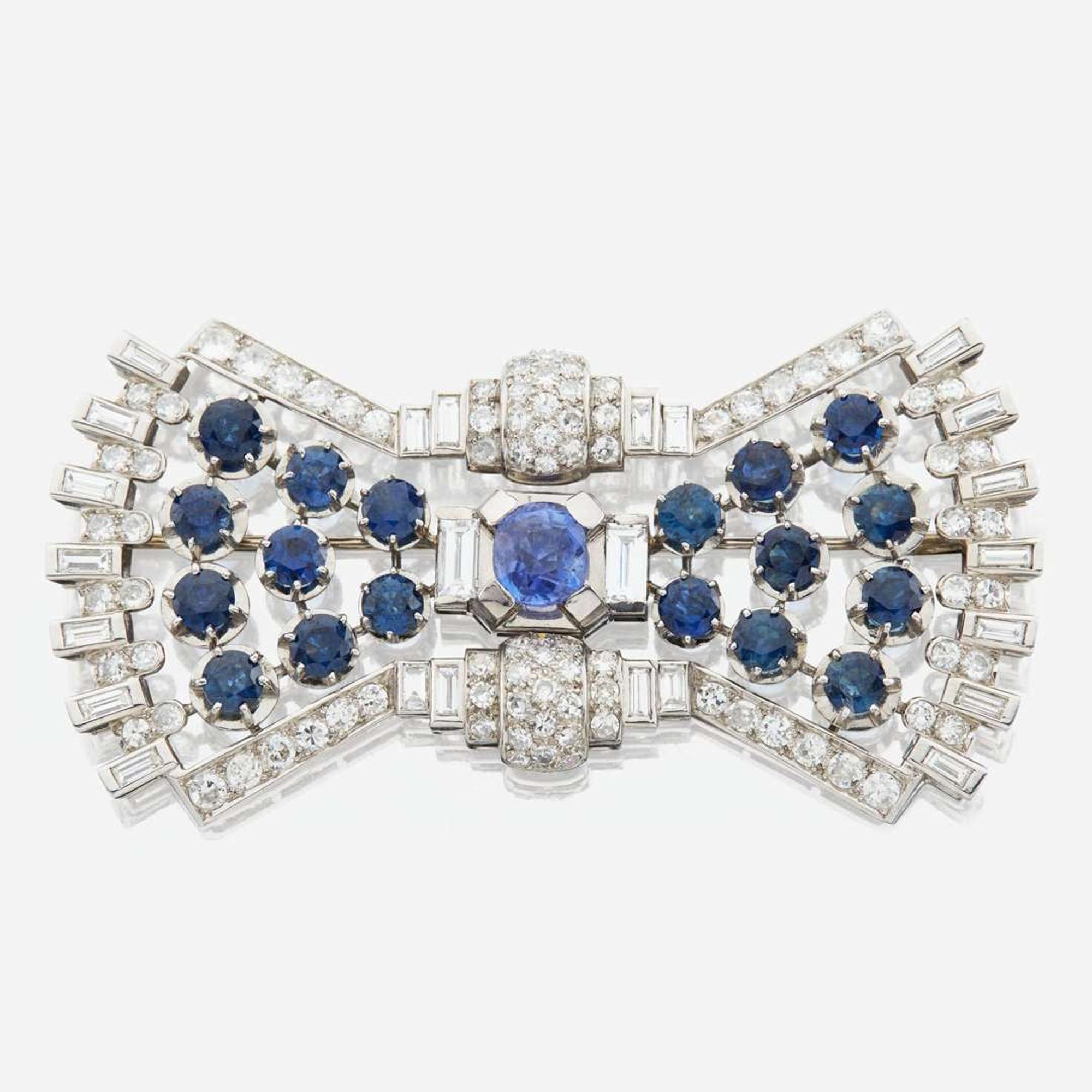 A diamond, sapphire, and platinum brooch