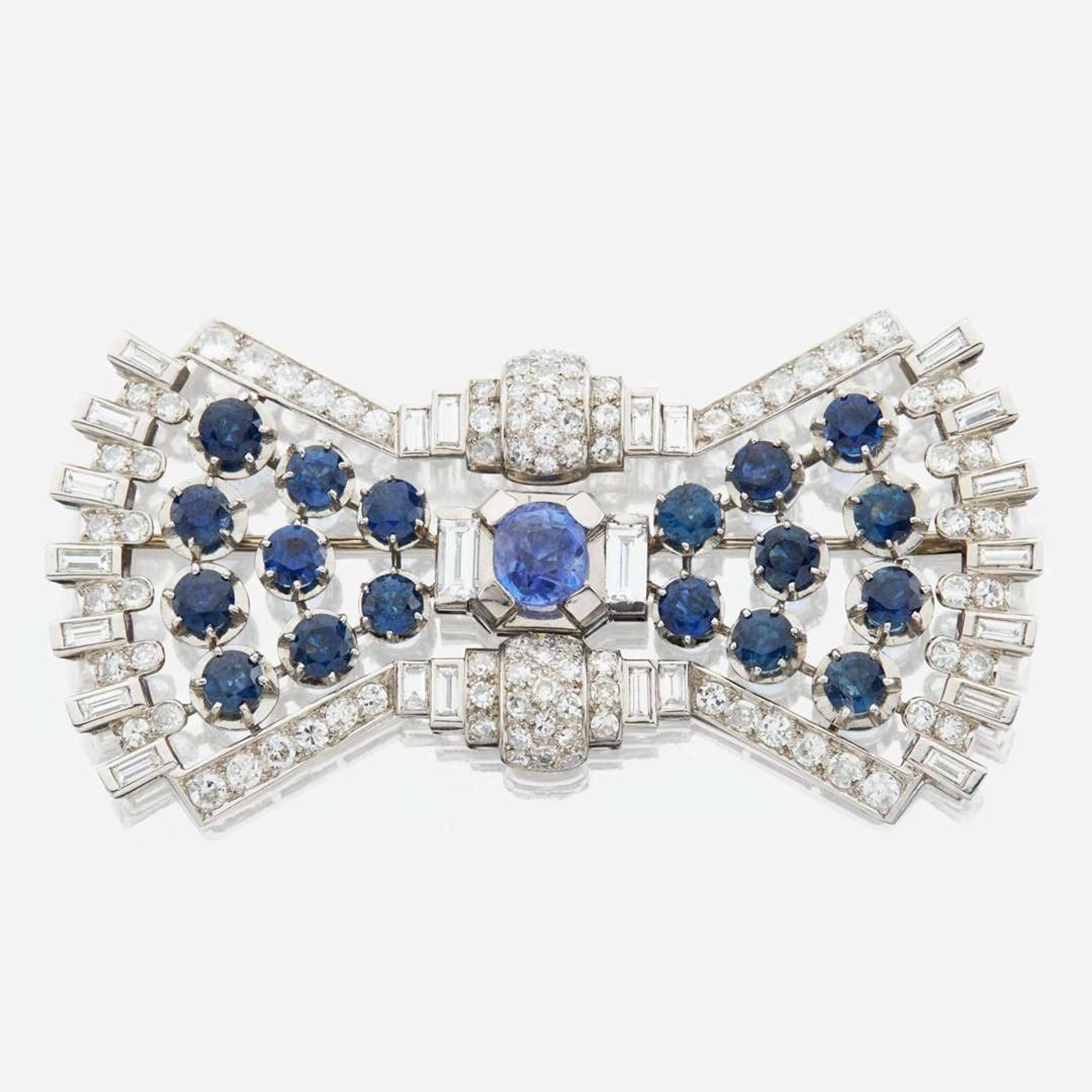 A diamond, sapphire, and platinum brooch