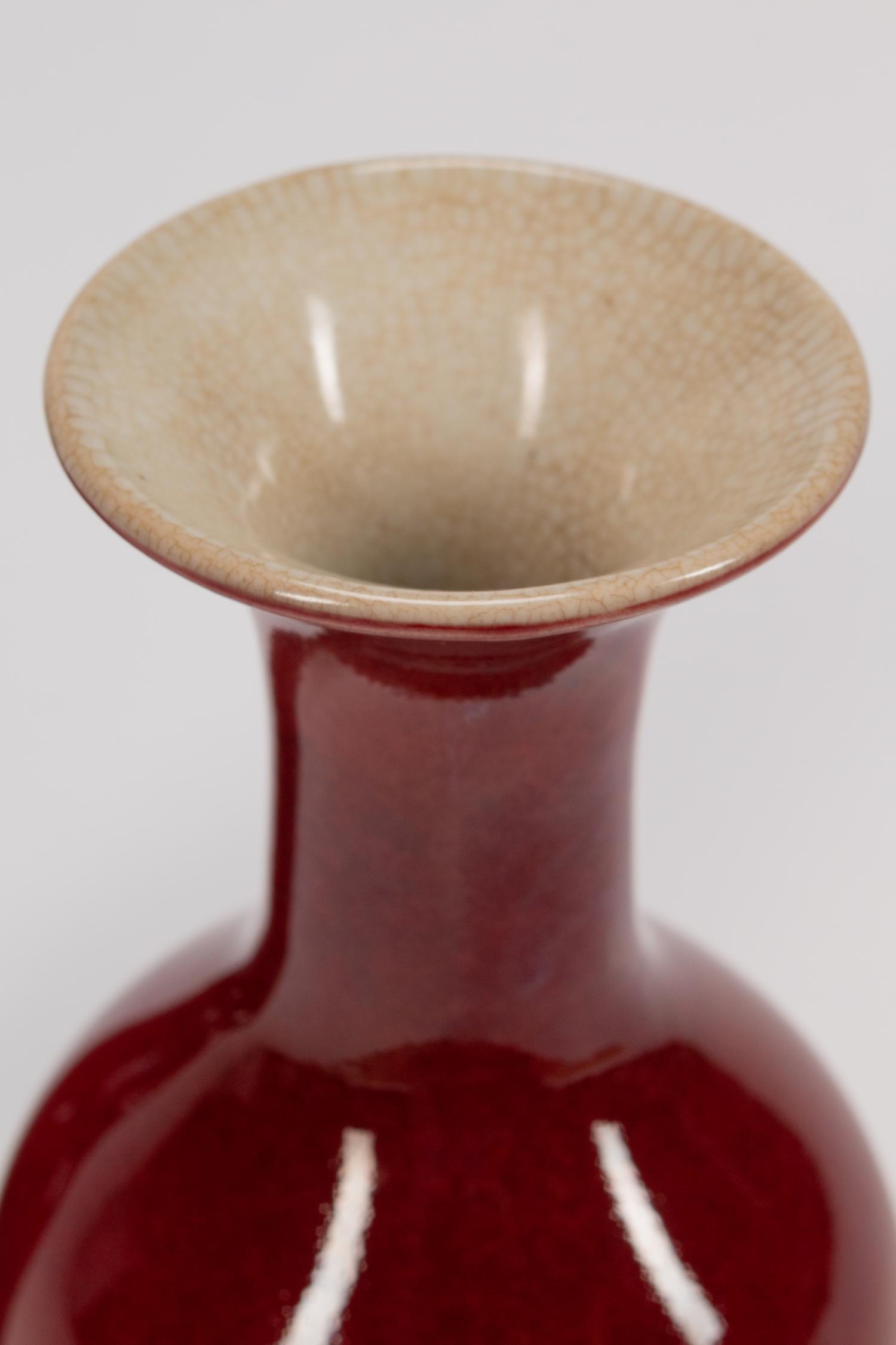 A Pair of Chinese Sang de Boeuf-Glazed Porcelain Shouldered Ovoid Vases
