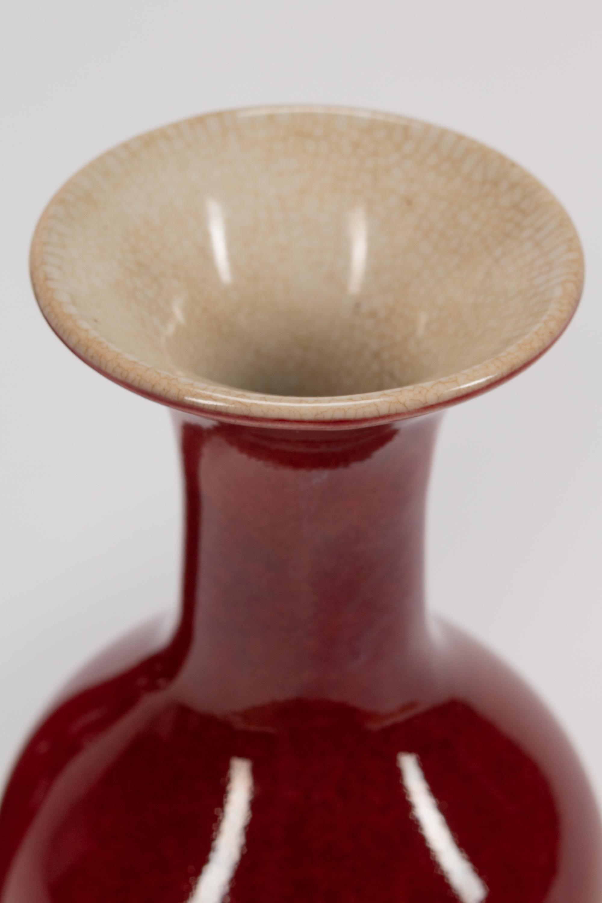 A Pair of Chinese Sang de Boeuf-Glazed Porcelain Shouldered Ovoid Vases