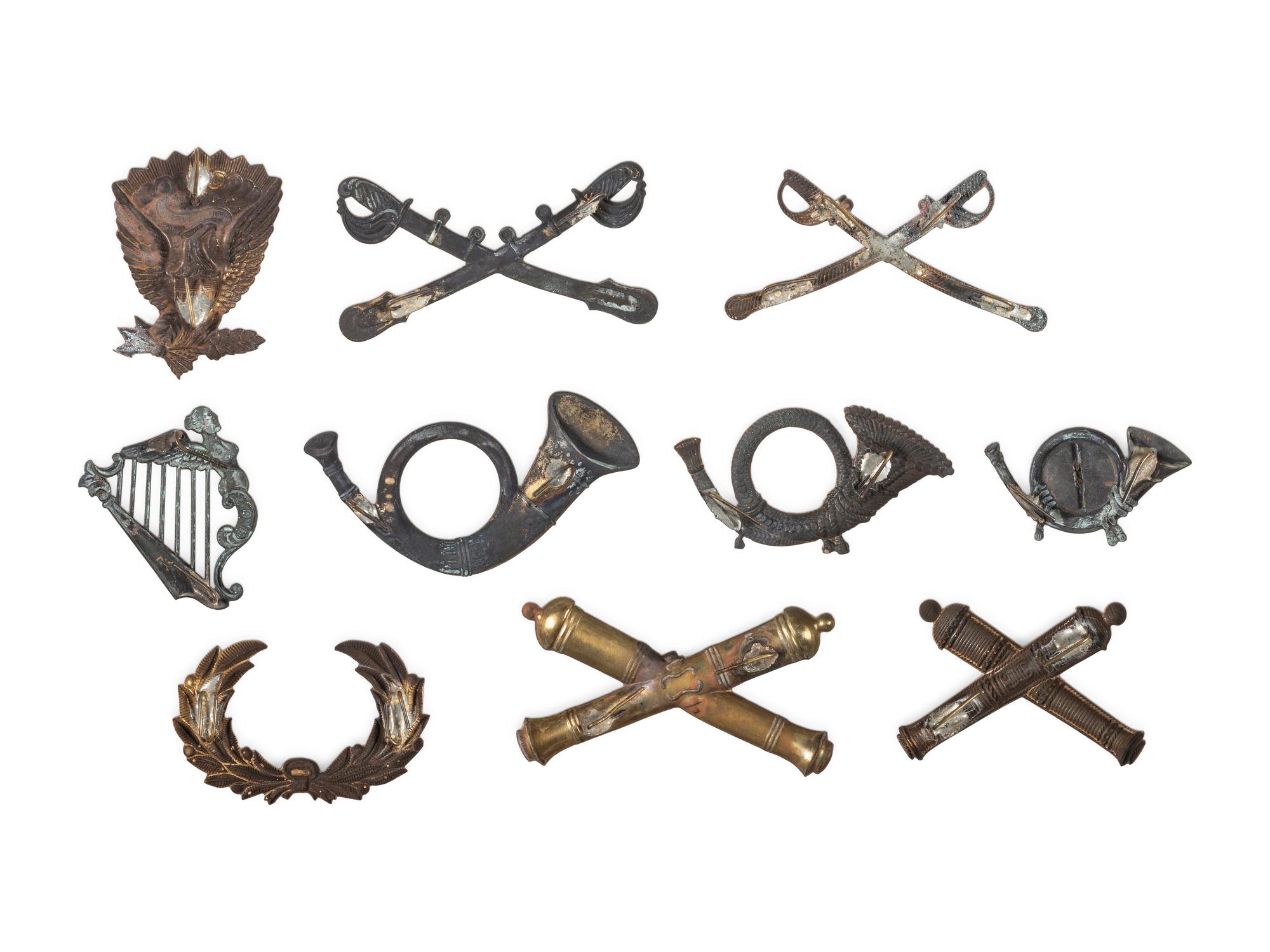 A group of 10 reproduction Civil War insignia. [Ca 1960s].