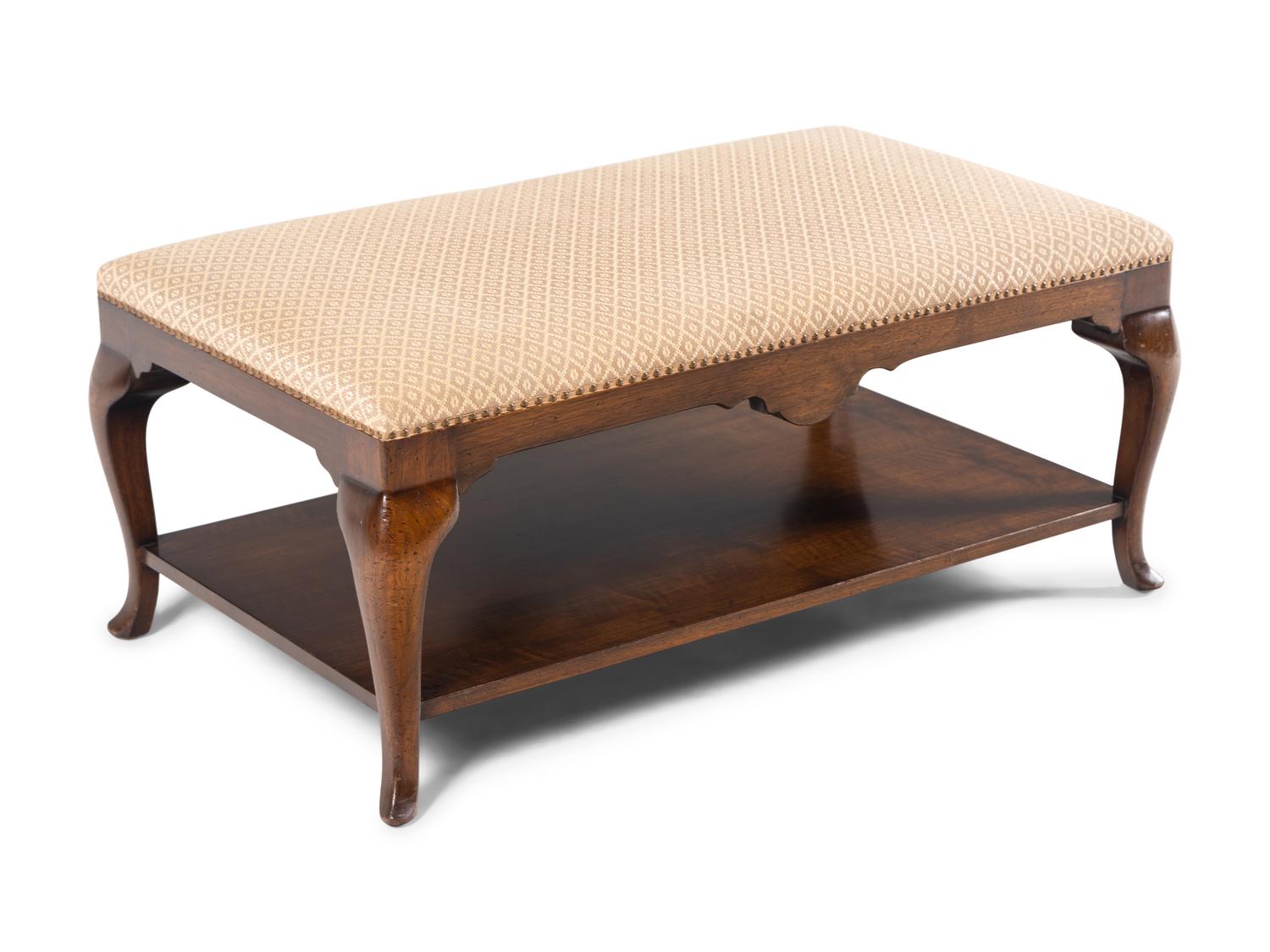 A Queen Anne Style Upholstered Two-Tier Coffee Table