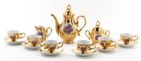An Austrian Gilt and Painted Porcelain Tea Service Height of teapot 7 1/2 inches.