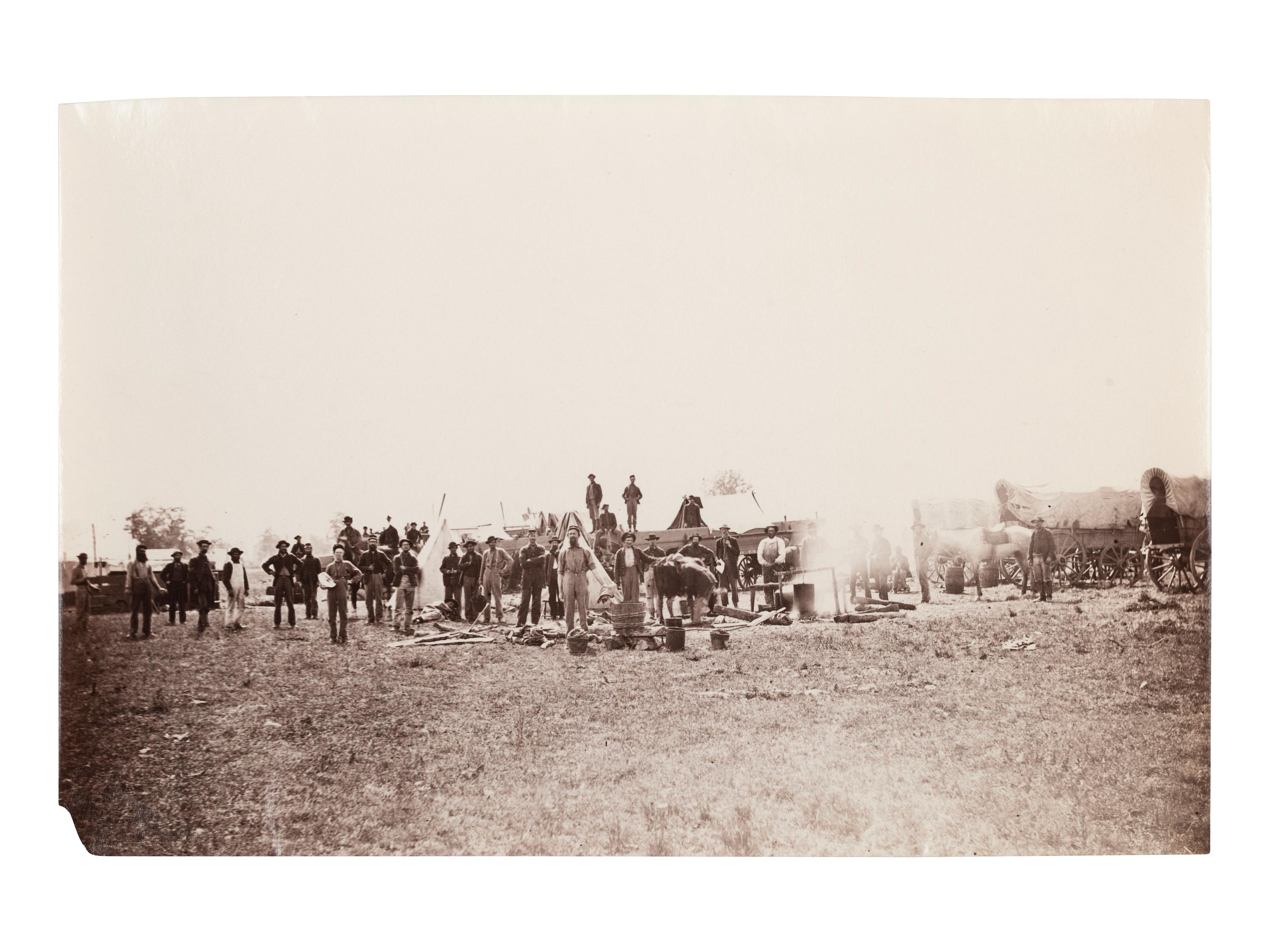 [CIVIL WAR]. Photographer unknown. View of unidentified company of soldiers and civilians in the field. 1861-1865.