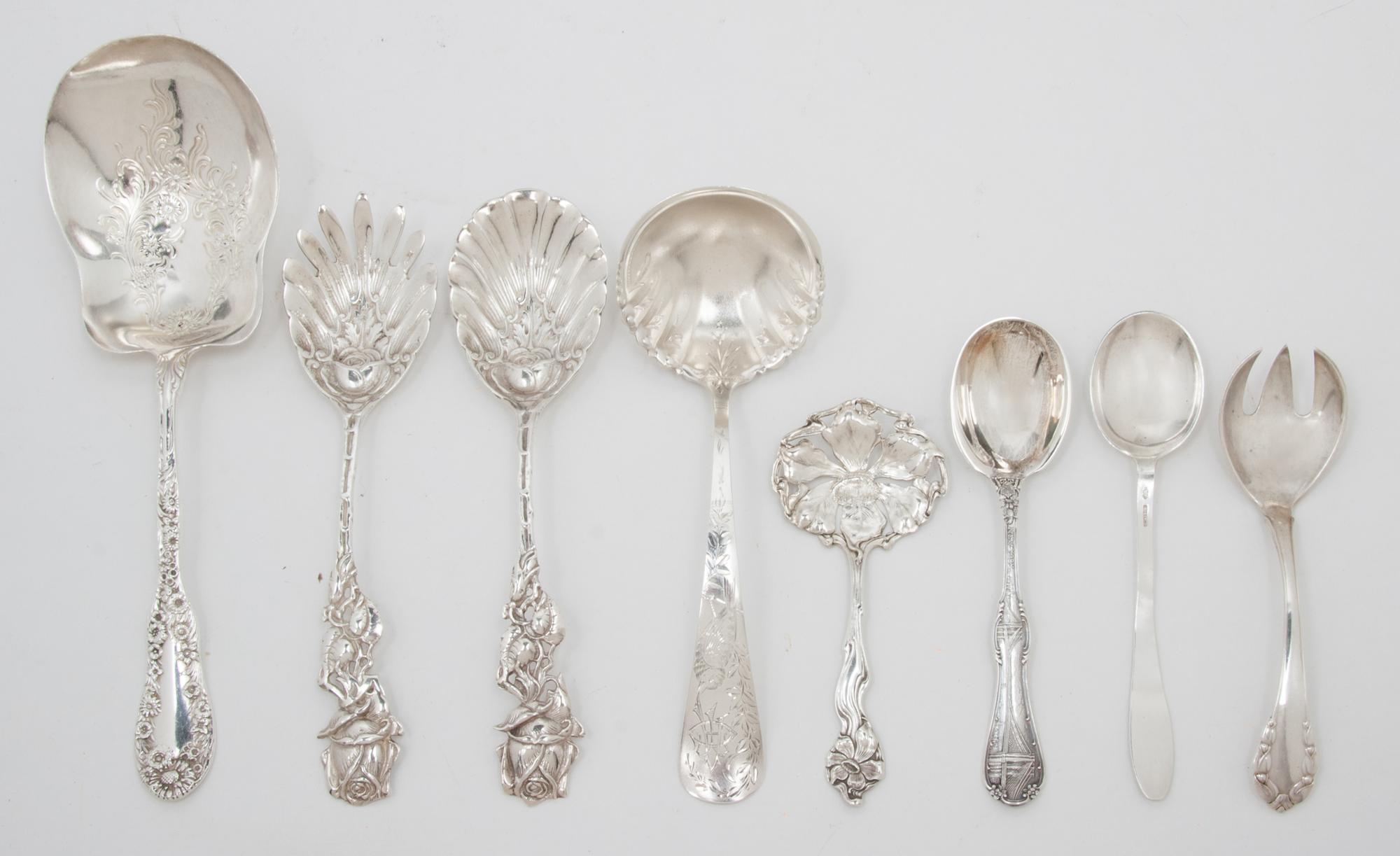 An Assembled Group of Silver Spoons, Various Makers, comprising 1 Dominick & Haff serving spoon, 1 shell form spoon with rose handle, 1