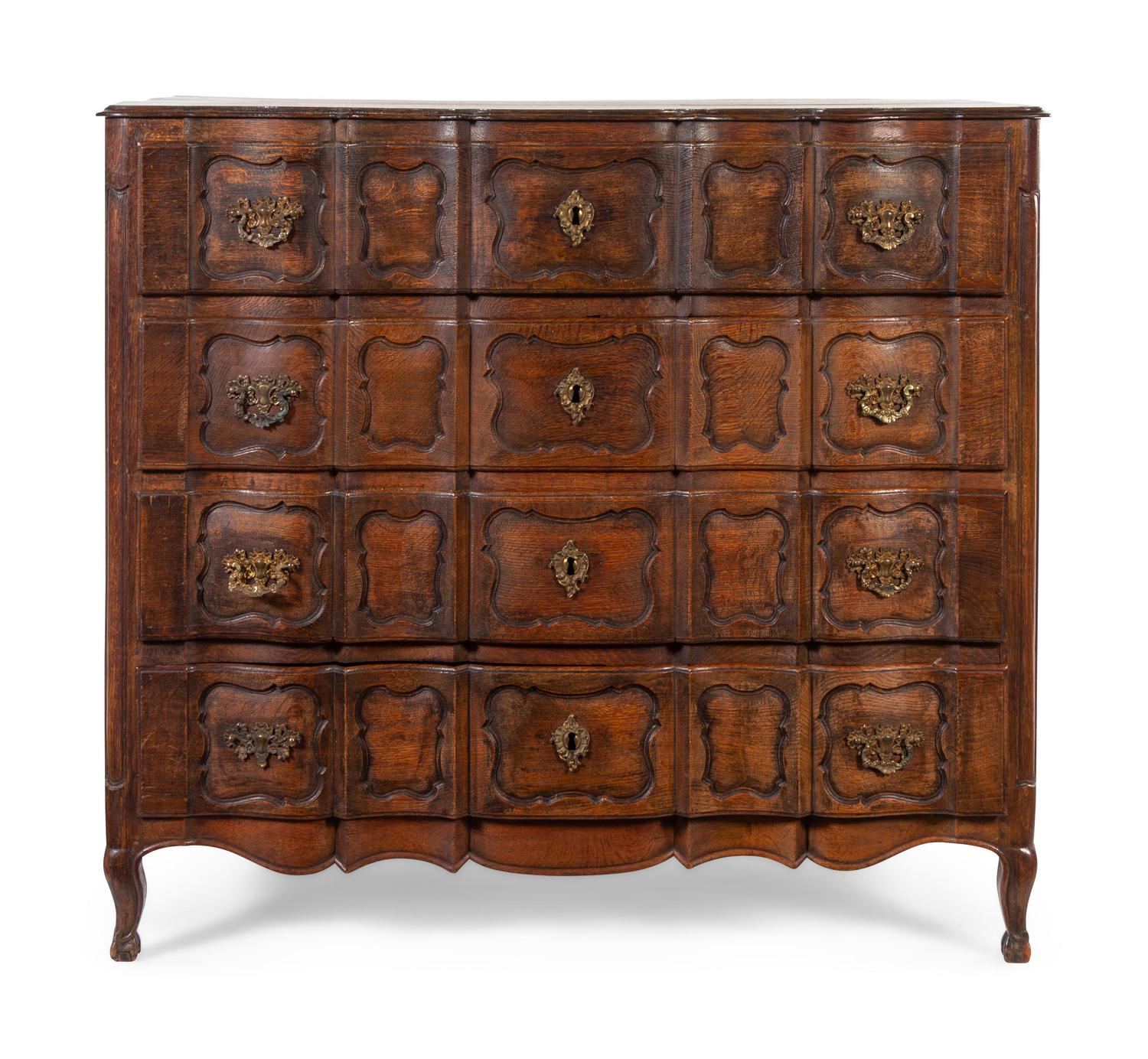 A Louis XV Provincial Style Oak Commode