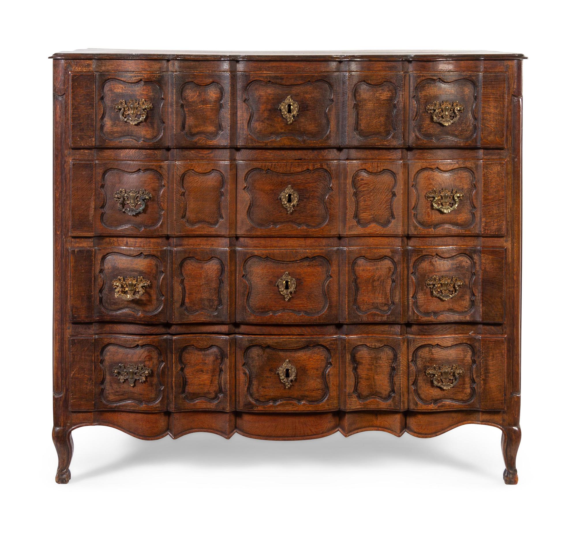 A Louis XV Provincial Style Oak Commode