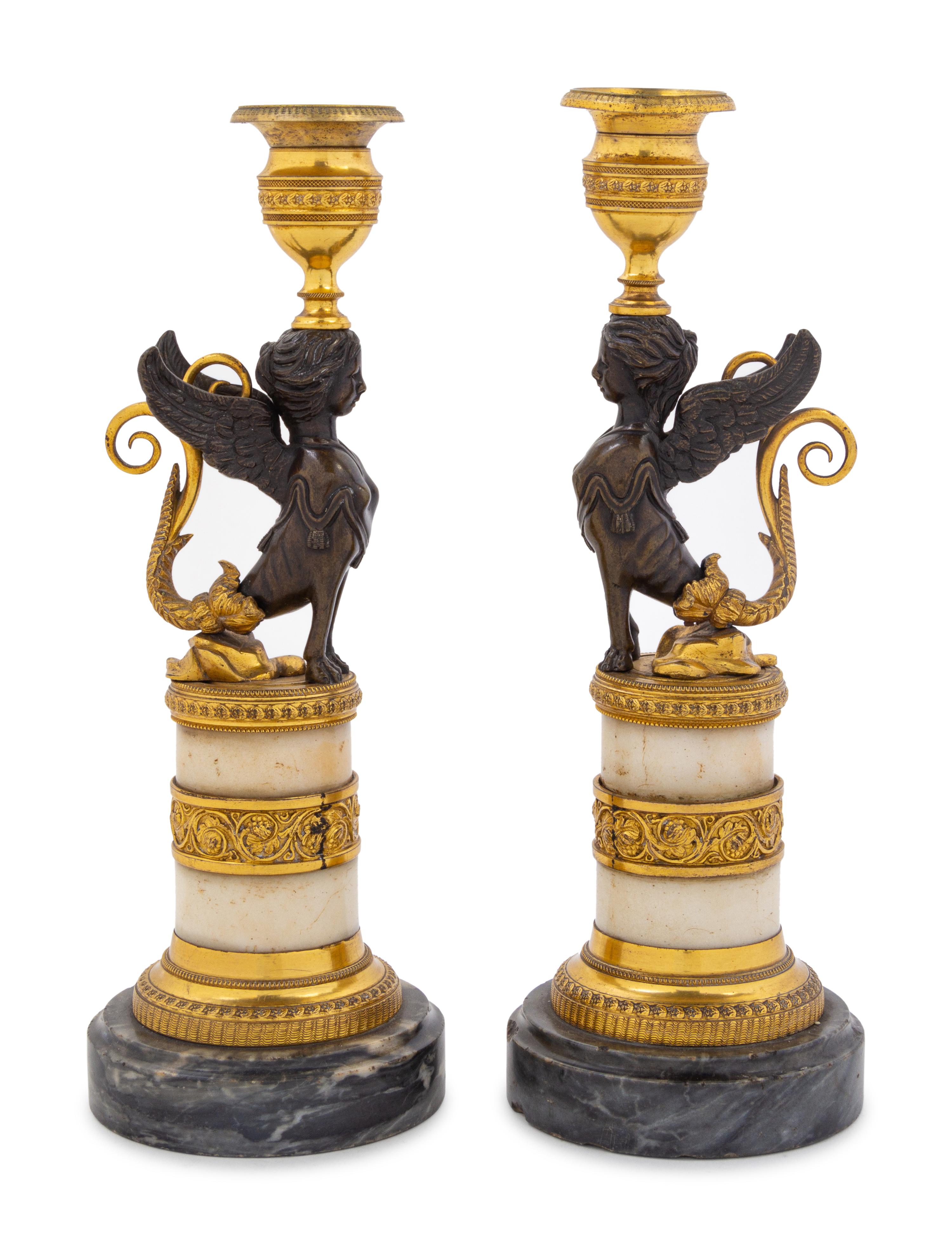 A Pair of Empire Style Gilt Bronze Mounted Marble Candlesticks