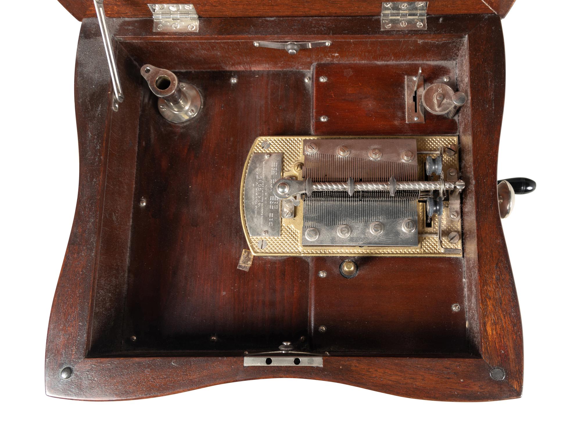 A Reginaphone Combination 12 Inch Disc Music Box and Phonograph