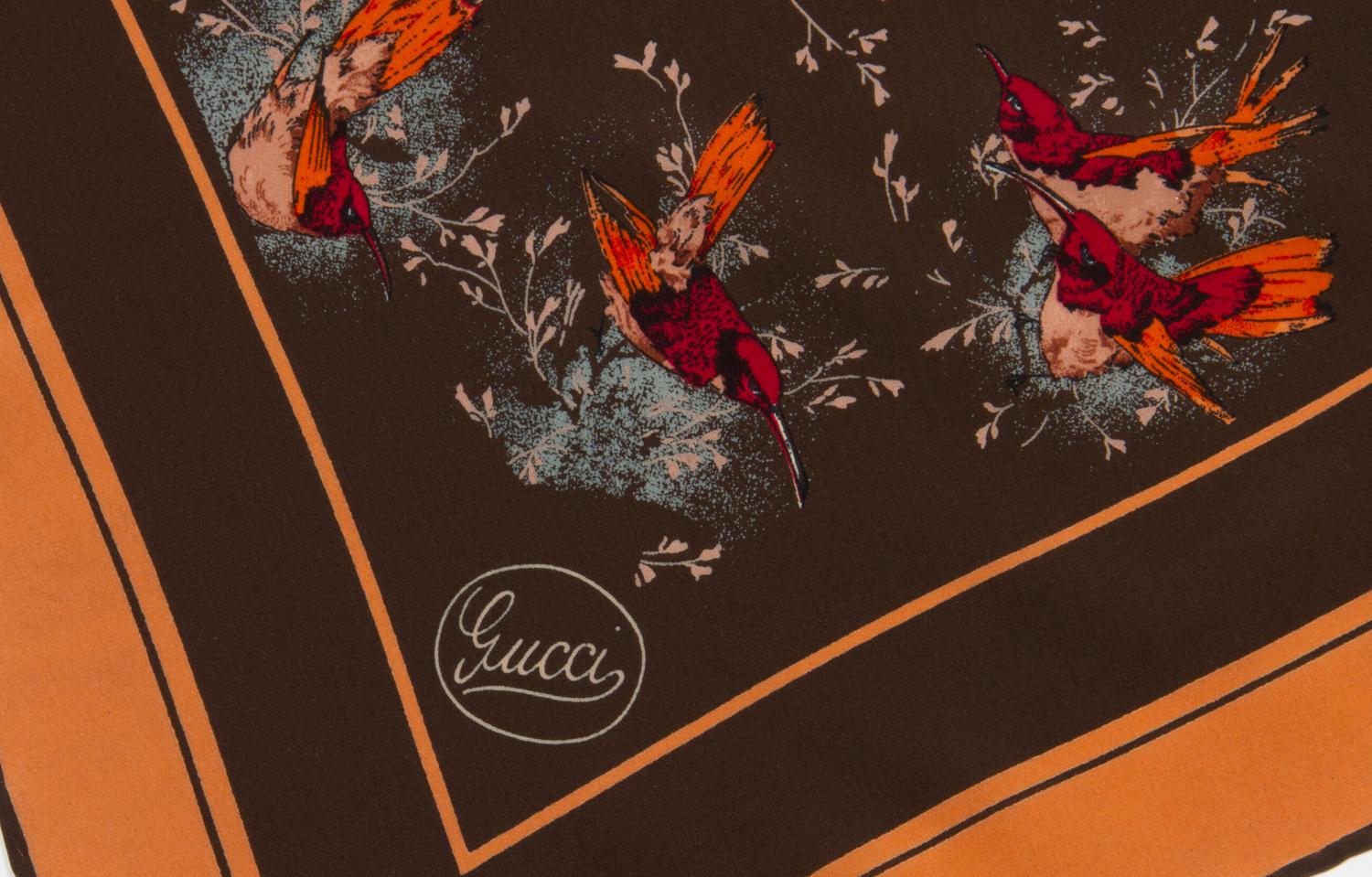 A Gucci Silk Scarf, 34" x 34".