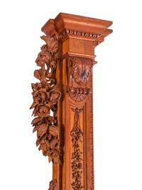 A Pair of Continental Carved Walnut Pilasters
