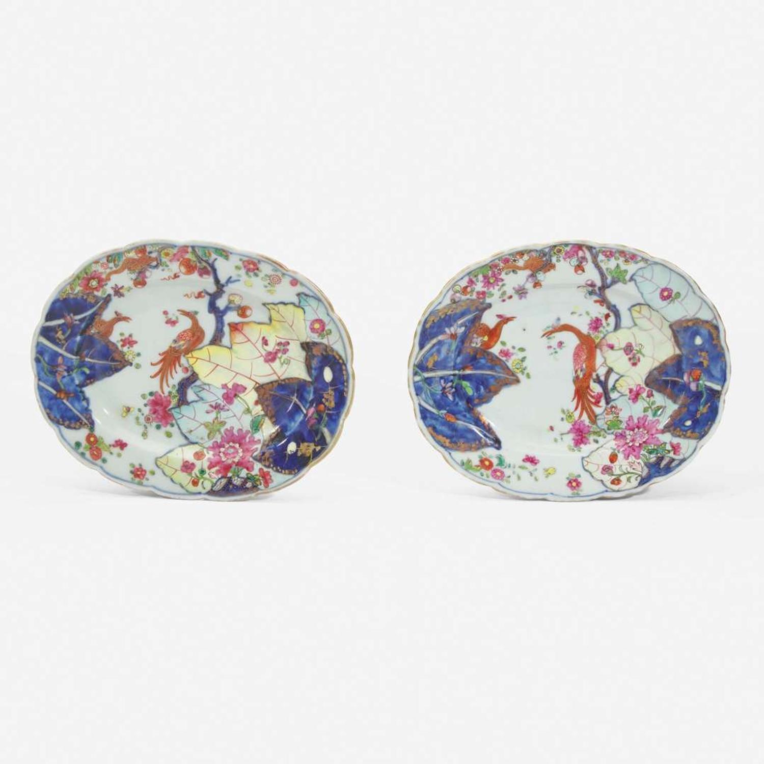 A pair of Chinese Export porcelain "Tobacco Leaf" butter tubs, covers, and stands circa 1775