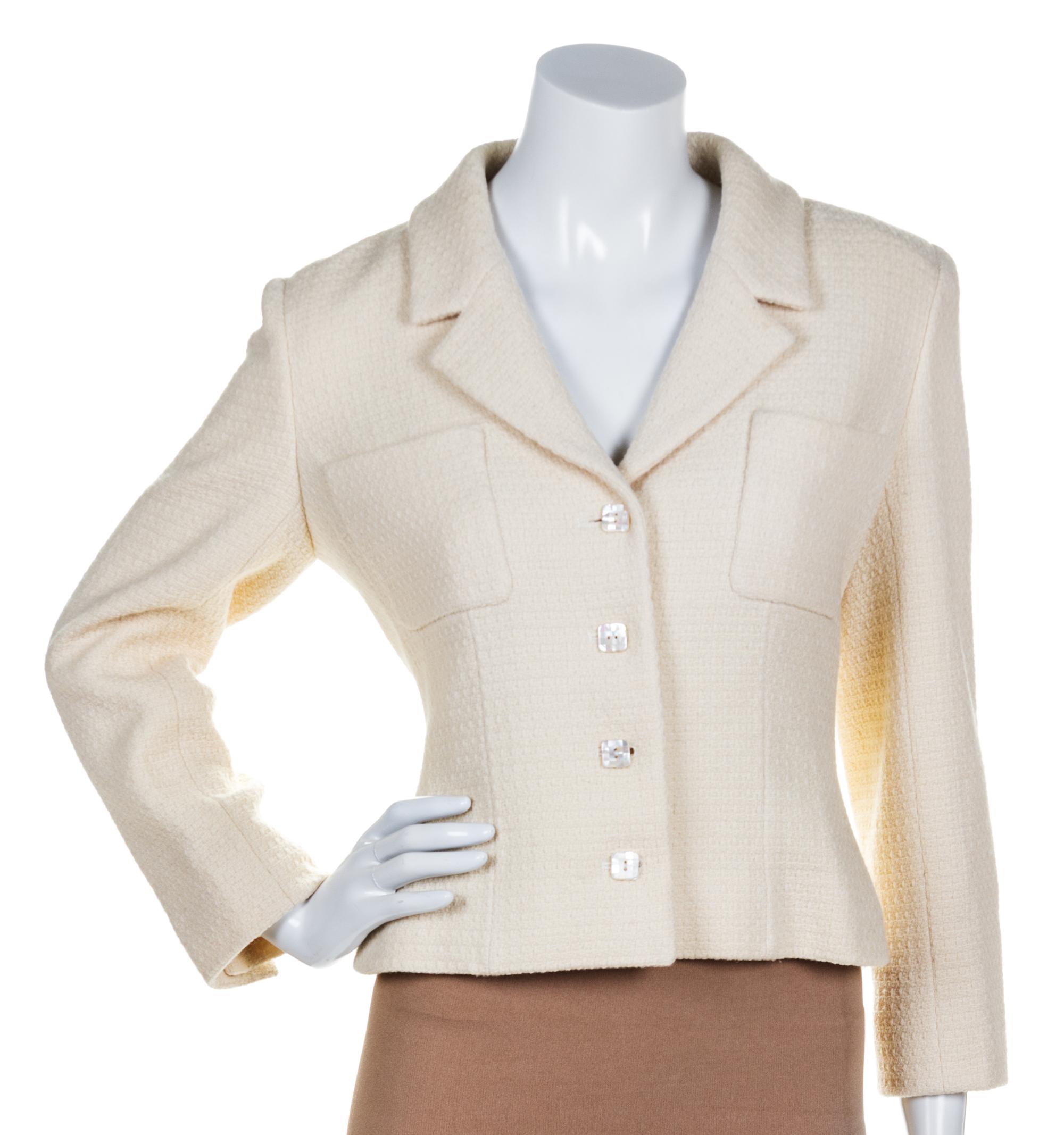 A Chanel Ivory Boucle Jacket, Size 40.