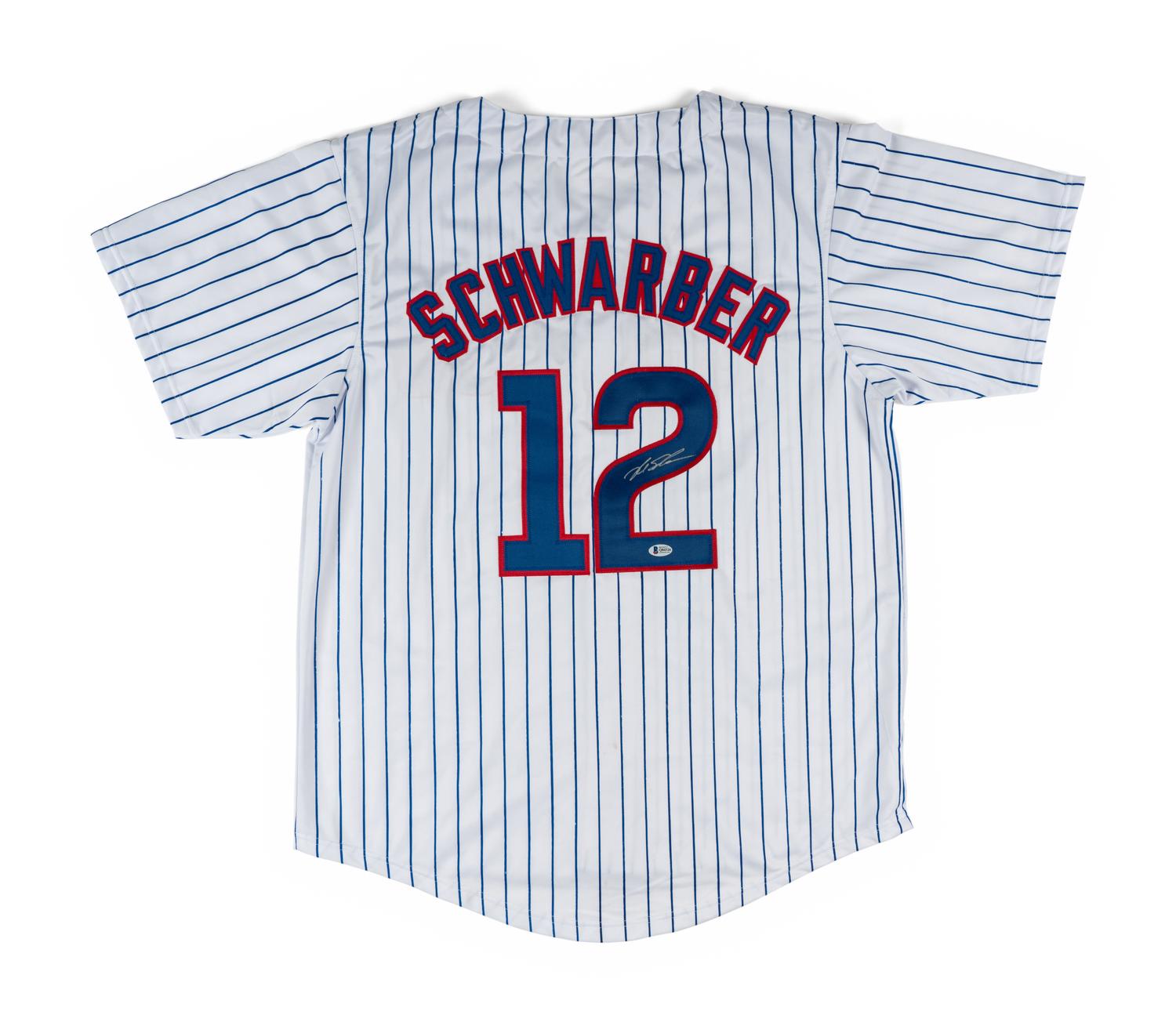 A Large Group of Chicago Cubs Memorabilia Featuring a Signed Kyle Schwarber Jersey