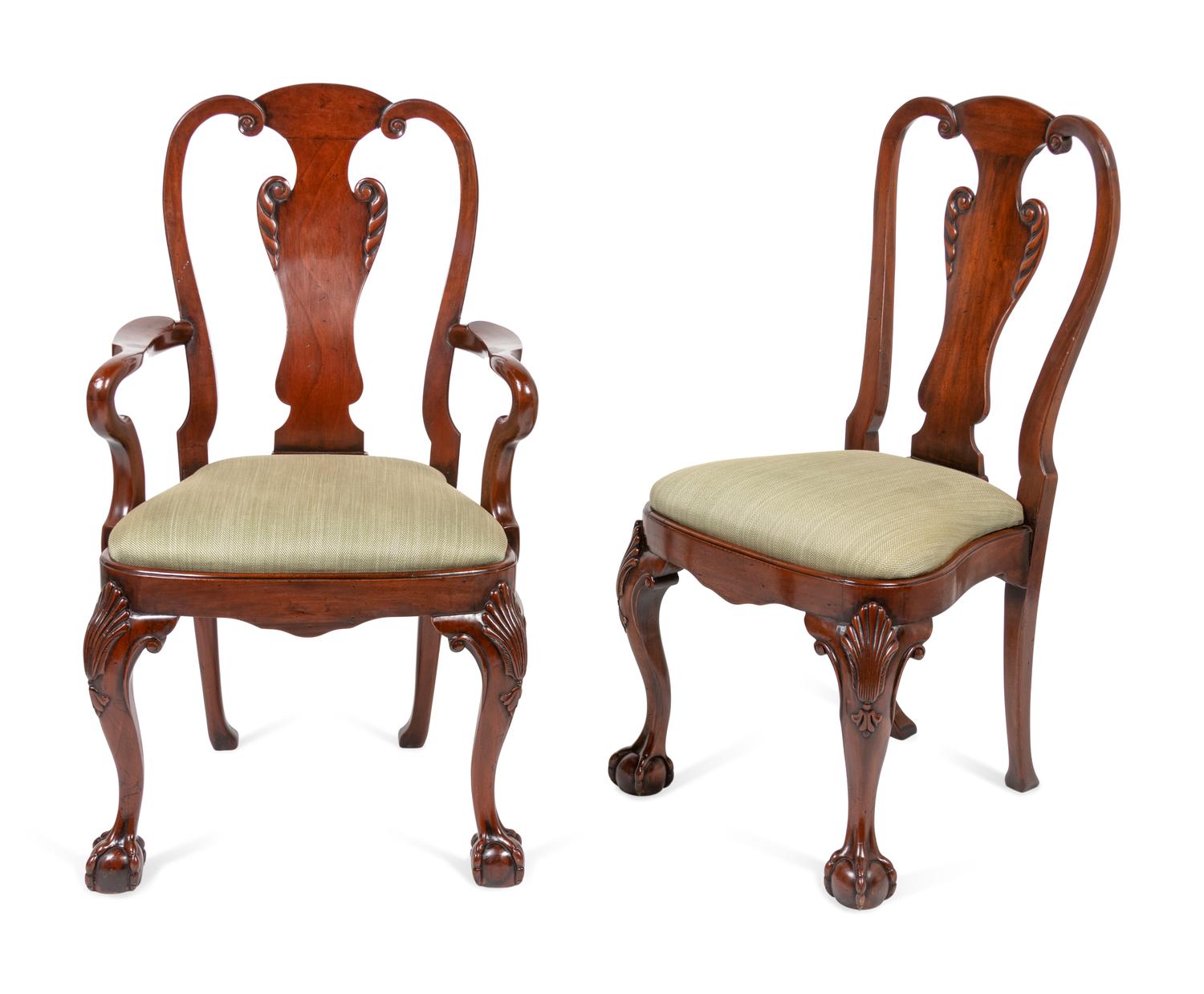 A Set of Eight George I Style Walnut Dining Chairs