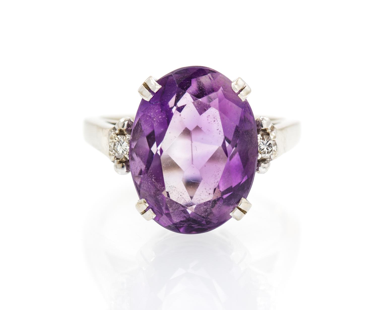 A 14 Karat White Gold, Amethyst and Diamond Ring, 4.60 dwts.