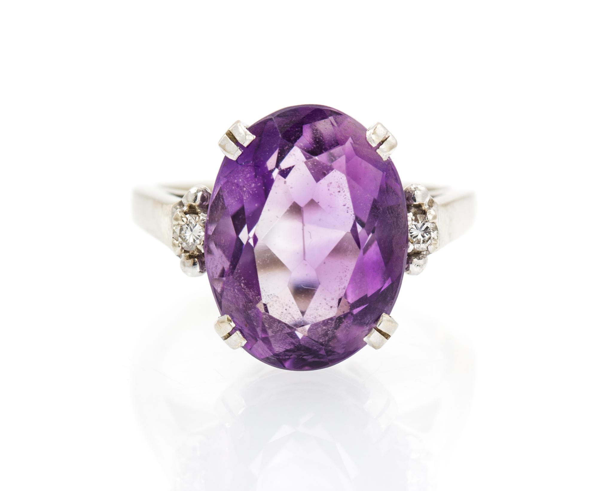 A 14 Karat White Gold, Amethyst and Diamond Ring, 4.60 dwts.