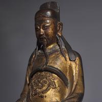 A Chinese Gilt-Lacquered Bronze Figure of a Seated Deity, Ming Dynasty — 明 銅漆金文昌公坐像