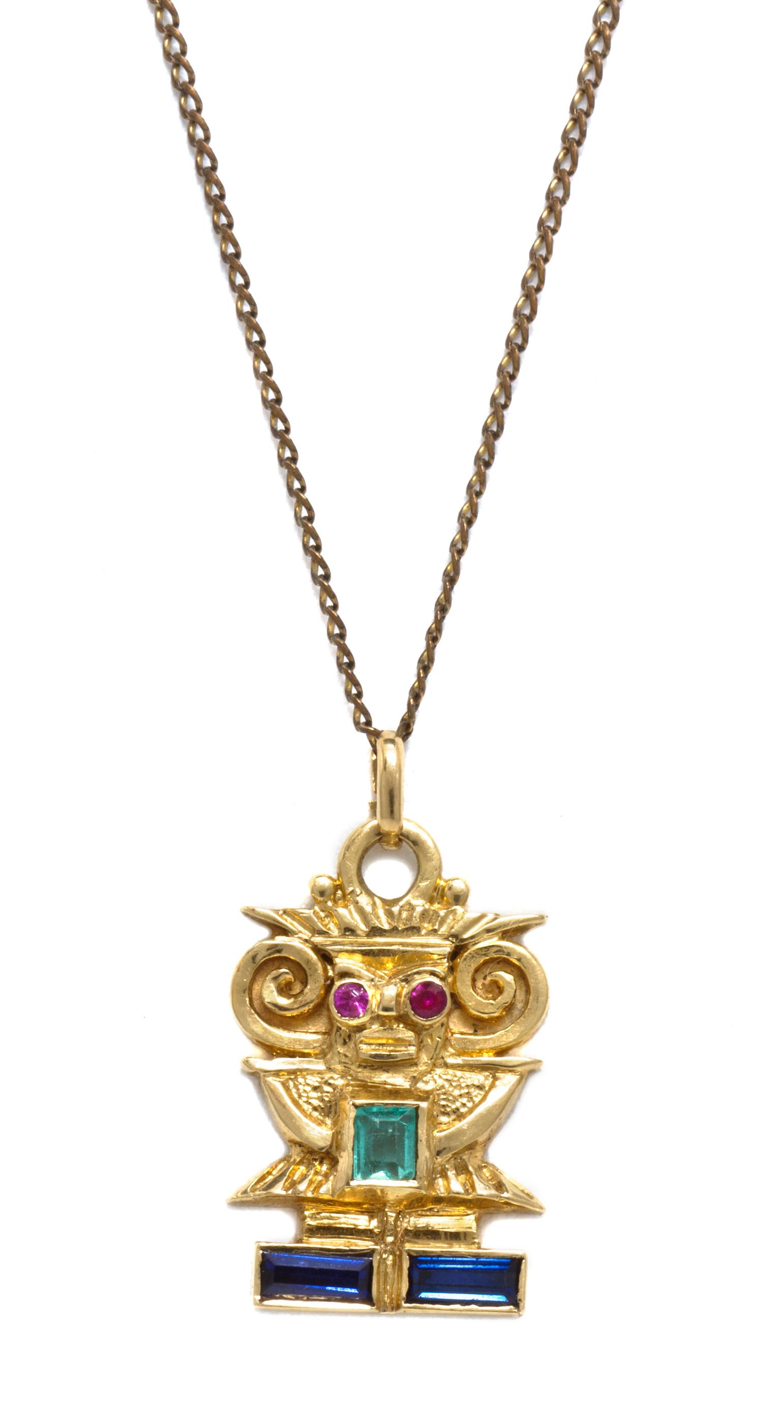 An 18 Karat Yellow Gold, Sapphire, Emerald and Ruby Aztec Motif Pendant, 2.80 dwts.