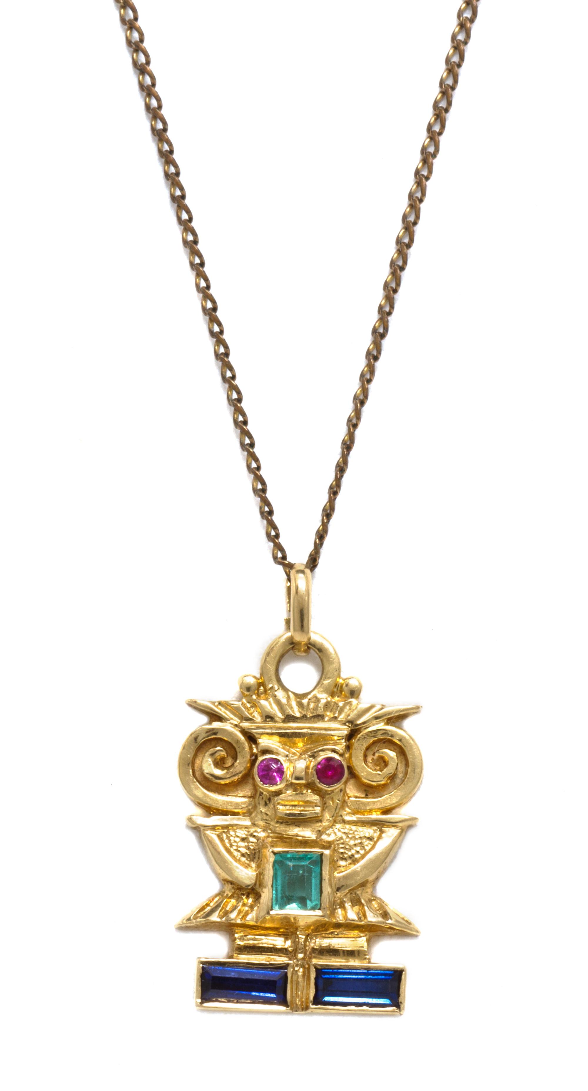 An 18 Karat Yellow Gold, Sapphire, Emerald and Ruby Aztec Motif Pendant, 2.80 dwts.