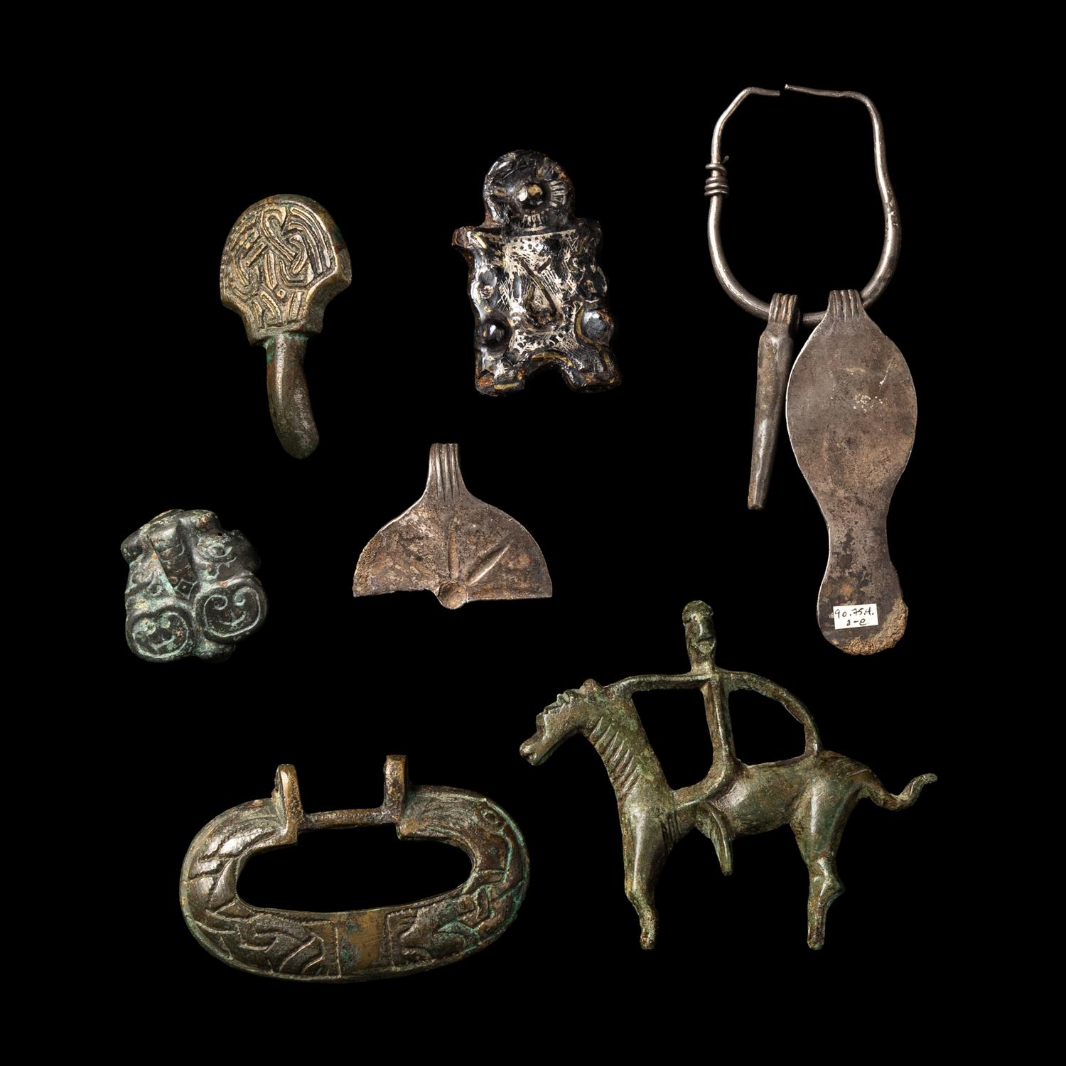 Seven Eurasian Bronze and Silver Items